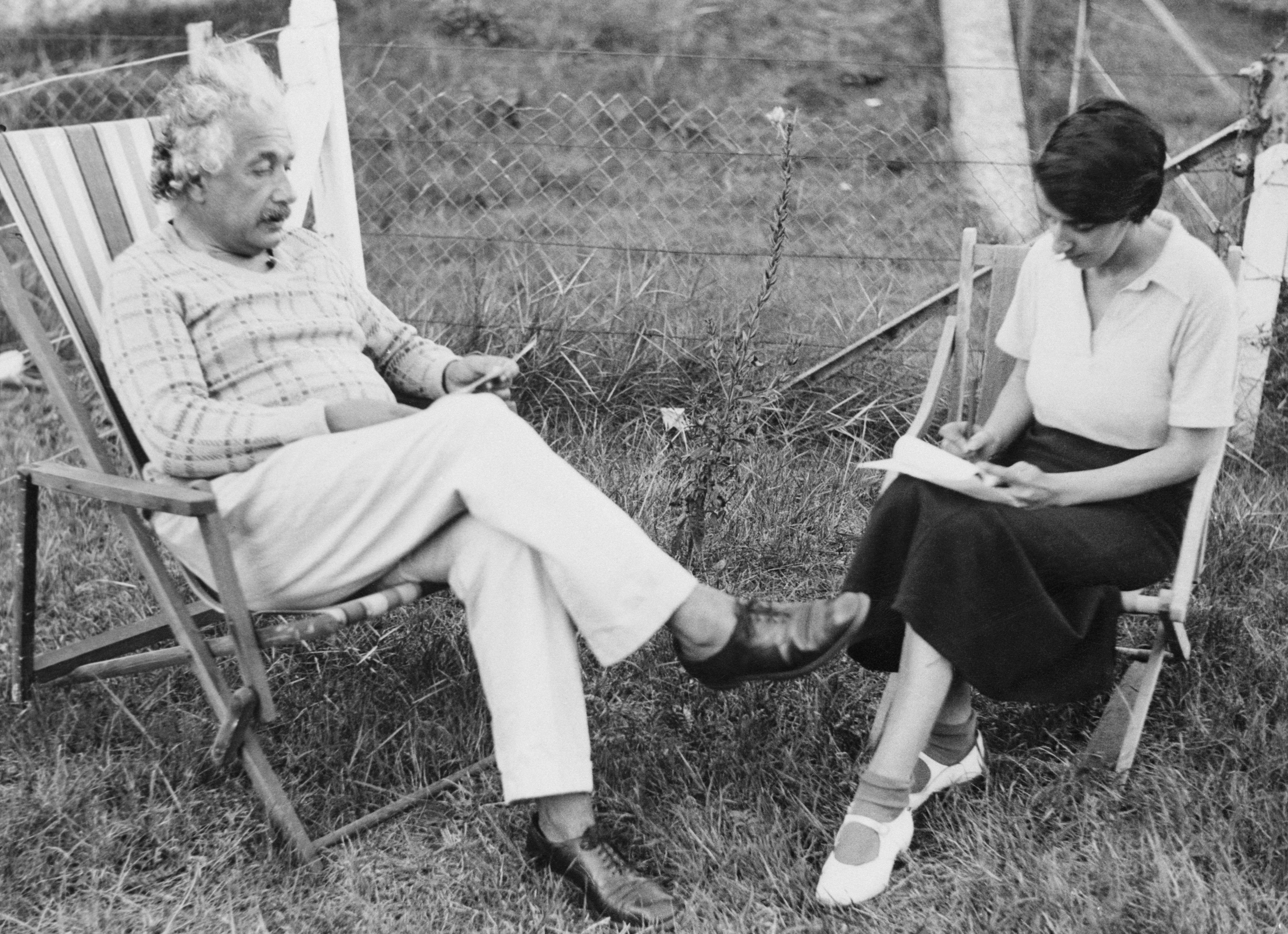 Albert Einstein sitting beside his secretary in Belgium | Source: Getty Images