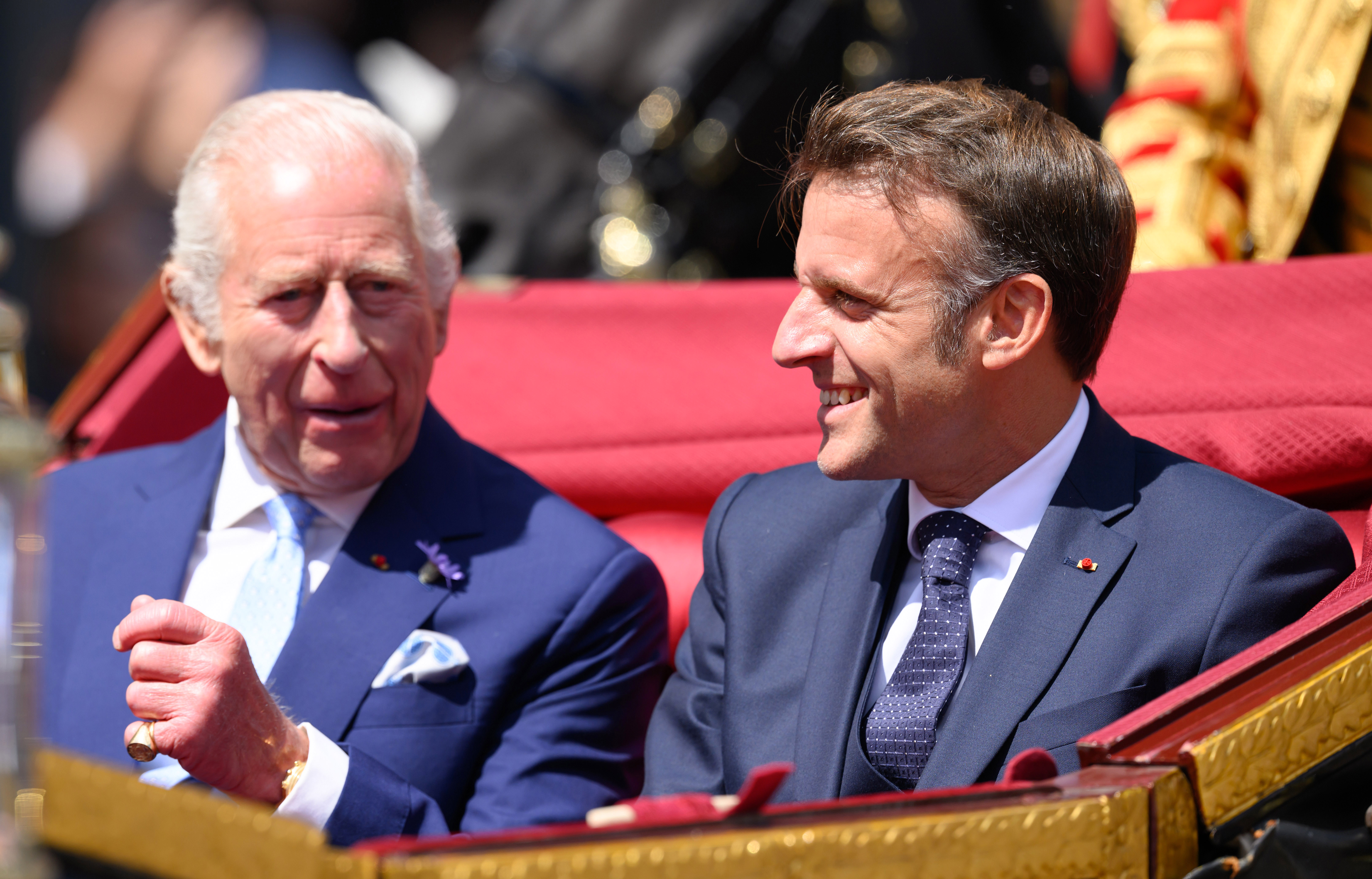 King Charles III and Emmanuel Macron during the carriage procession to Windsor Castle on July 8, 2025, in Windsor, England | Source: Getty Images
