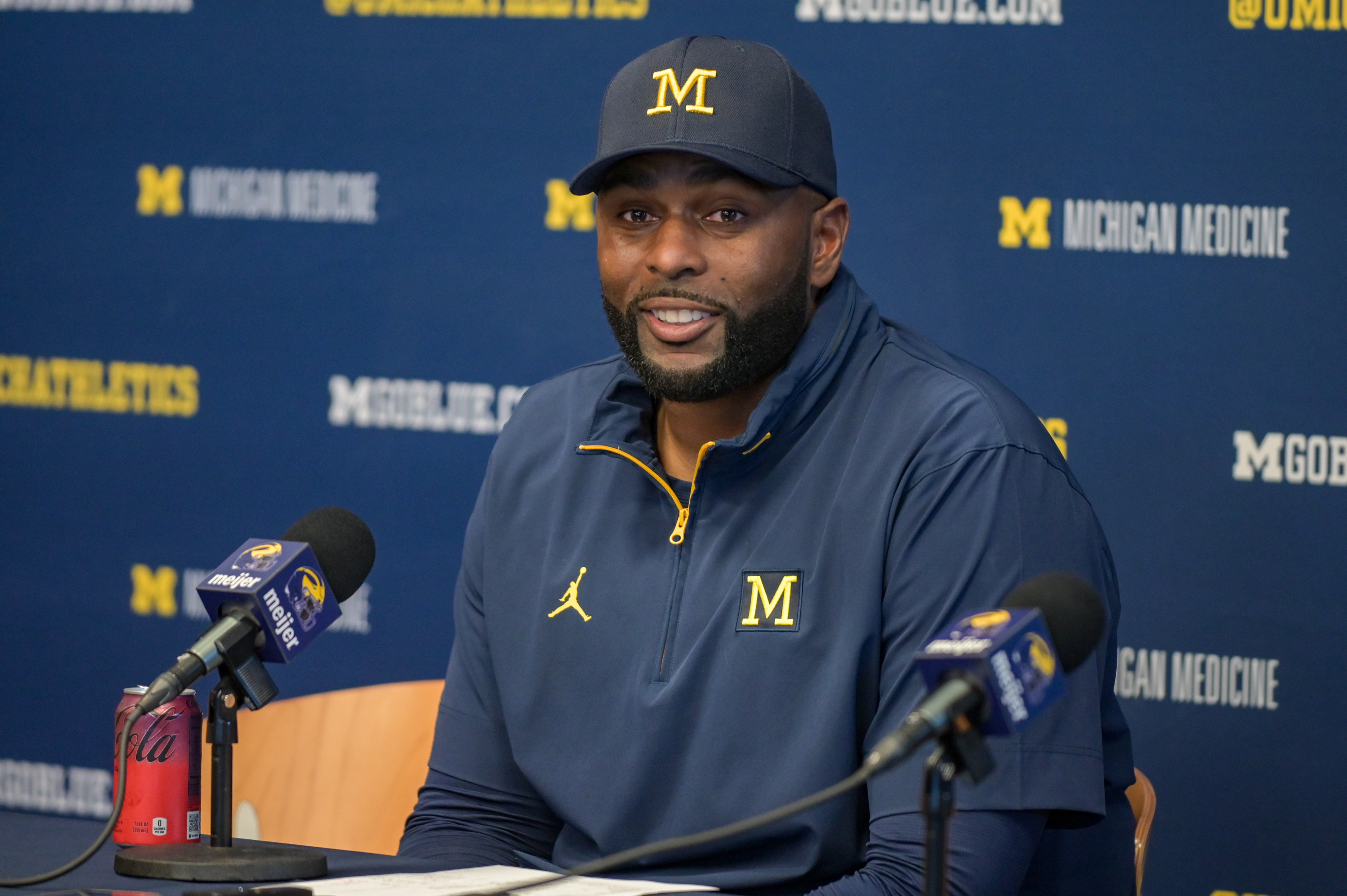 Sherrone Moore speaks to media during the post game press conference after a college football game against the Wisconsin Badgers on October 4, 2025 | Source: Getty Images