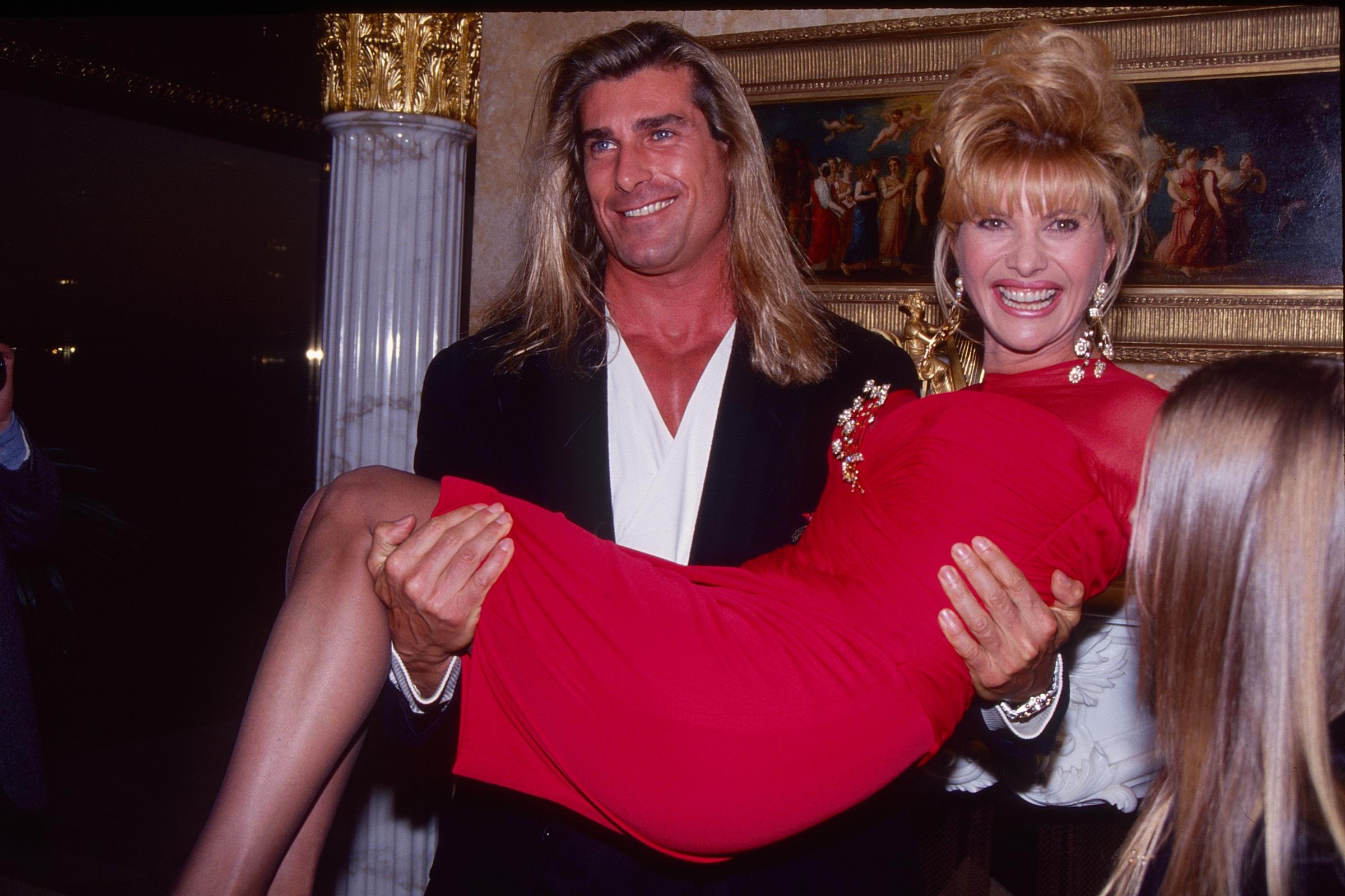 He was an influencer long before that term even existed. In this photo, the iconic romance book cover star smiled as he held Czech-American businesswoman Ivana Trump in his arms during the "A Novel Affair" Fundraiser for Muscular Dystrophy at Trump Tower in New York, New York, on October 25, 1993. | Source: Getty Images