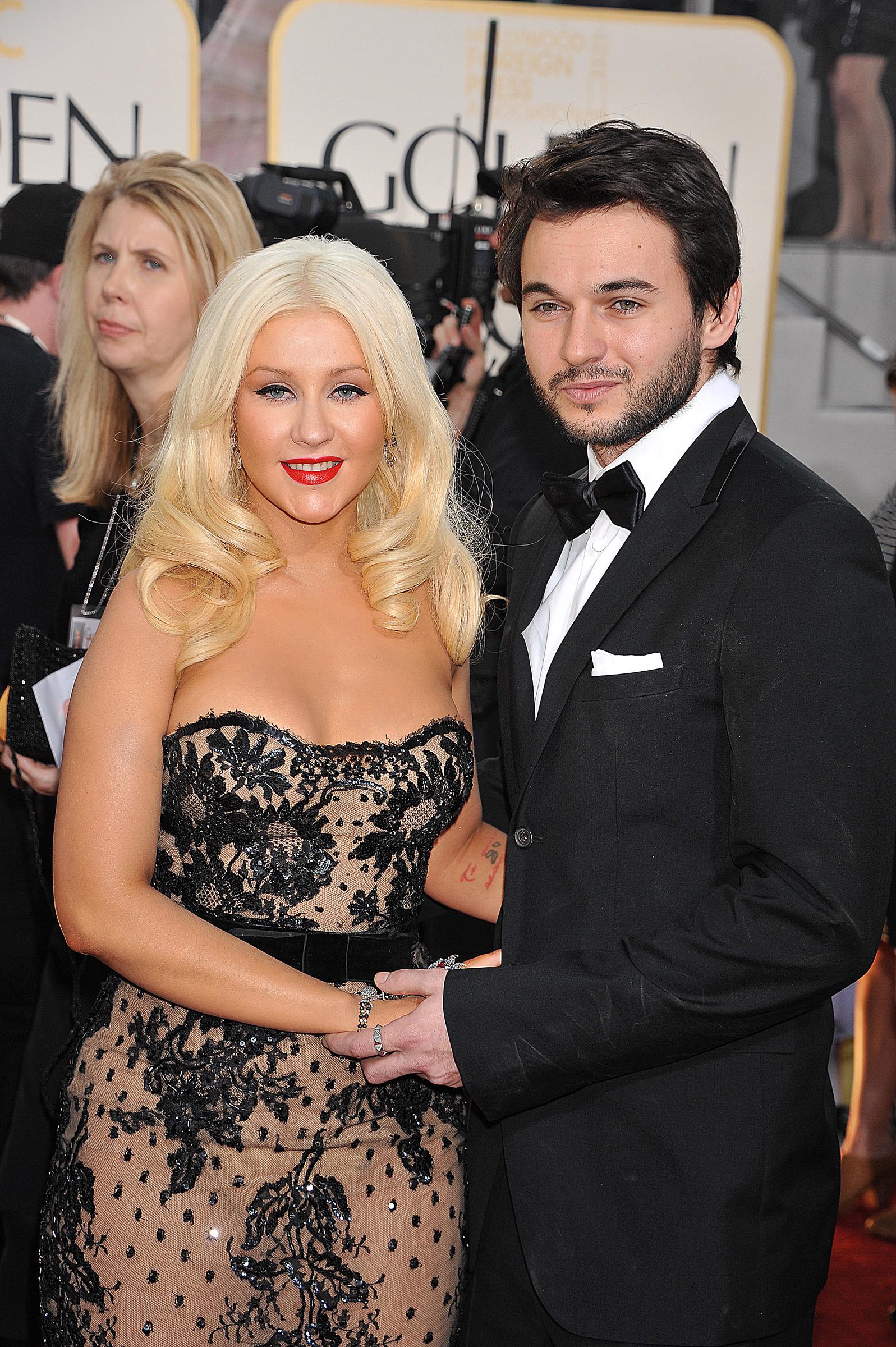 Cristina Aguilera and Matt Rutler arrive at the 68th Golden Globe Awards in 2011 | Source: Getty Images