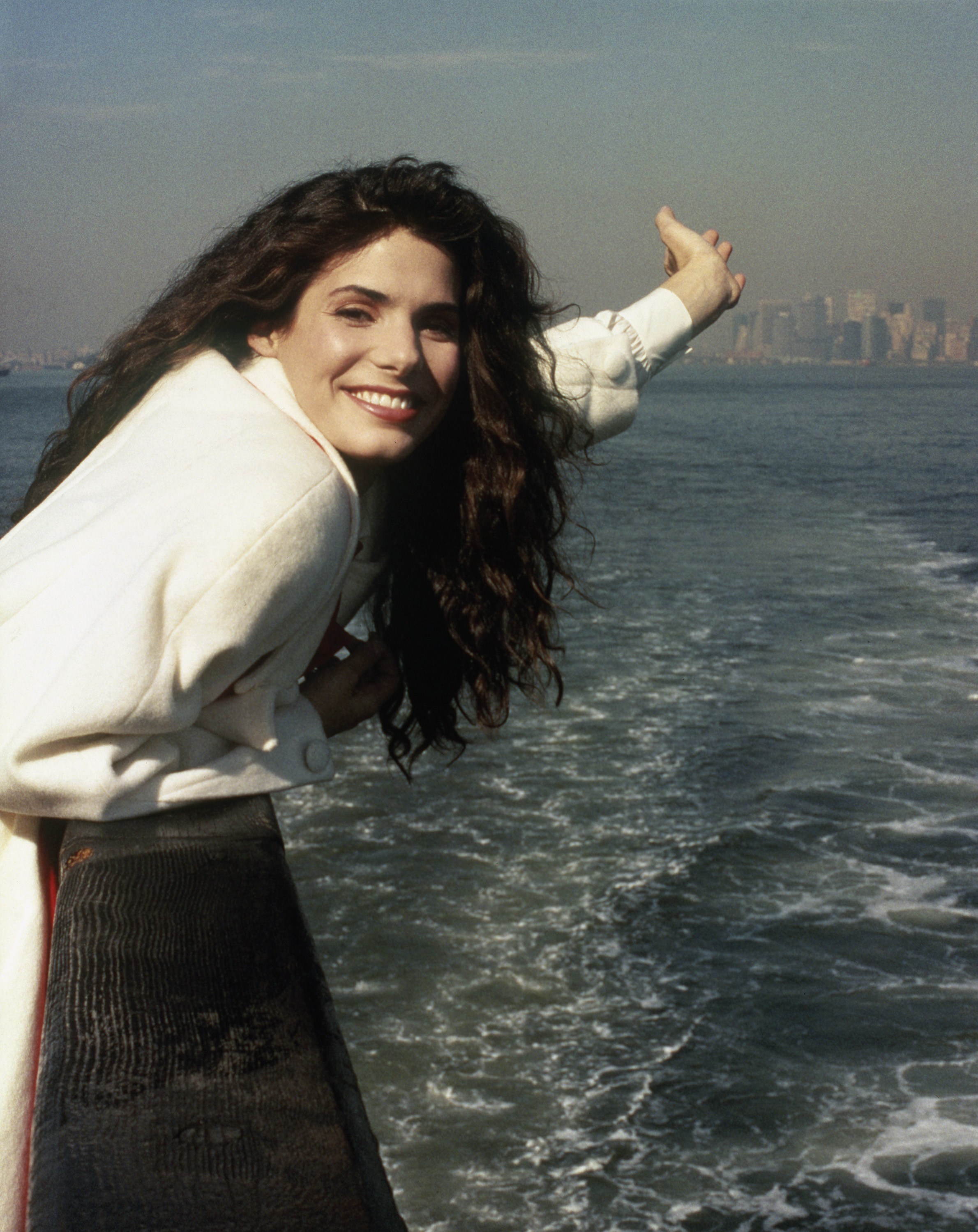 Bullock's 1990s photographs capture the familiar smile that would become one of her most recognizable features. That history helps explain why some fans concentrated so heavily on her mouth and teeth in the latest images.