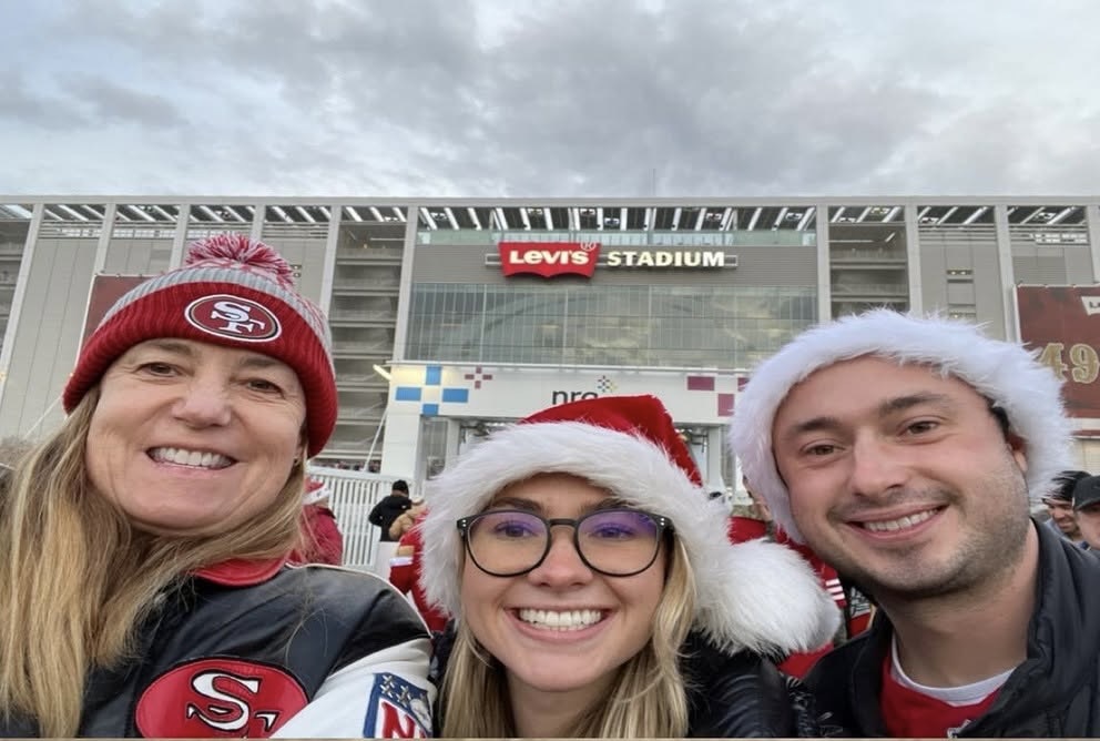Ann Mannix, left, enjoys a festive outing with two companions outside Levi’s Stadium, home of the San Francisco 49ers. A lifelong sports enthusiast, she treasured moments like these away from her demanding police career. | Source:  Facebook/@katie.mannix.5