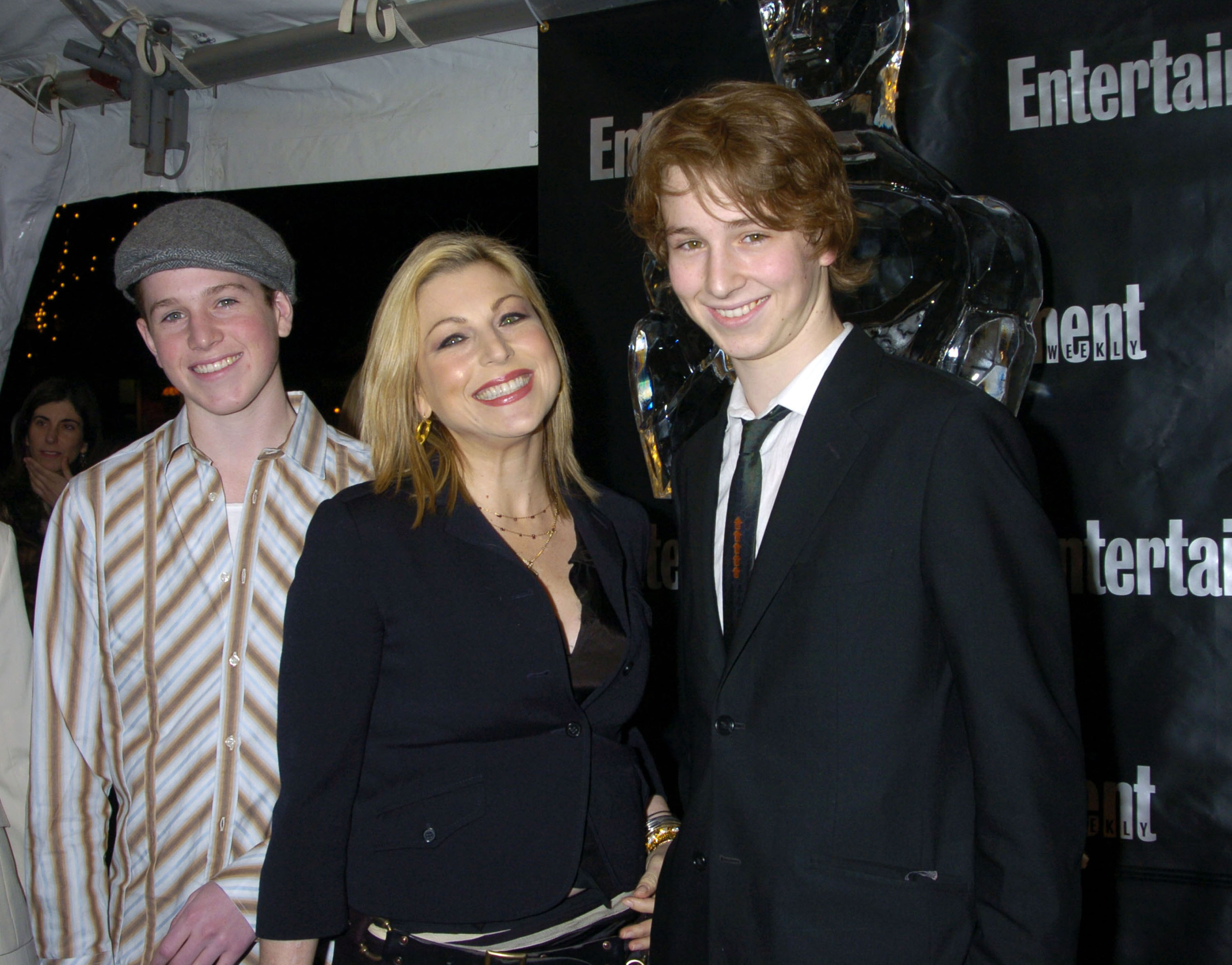 Tatum O'Neal posed with her sons Kevin and Sean McEnroe at an Entertainment Weekly event. Both sons would eventually pursue creative paths rather than professional tennis like their father, John McEnroe, with Kevin becoming a novelist and Sean working as a photographer. | Source: Getty Images.