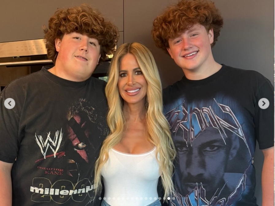 Kim Zolciak poses with her sons in a family photo as she continued to defend KJ following his arrest. Kim raised questions about the allegations against her son, saying the accuser had made similar claims involving two other people, while KJ's attorney, Jason Sheffield, maintained that the teenager is “100% innocent.” | Source: Instagram/kimzolciakbiermann