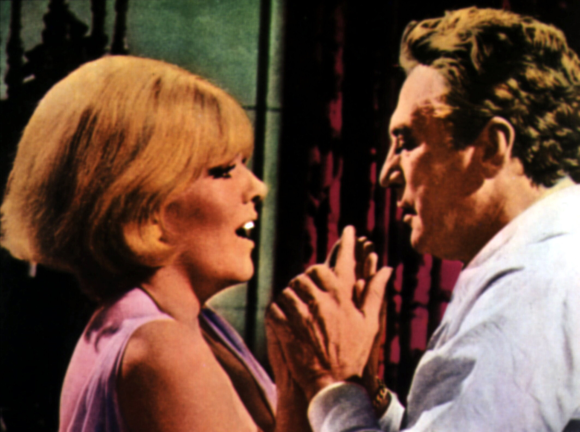 Kim Novak appears alongside Peter Finch in a scene from The Legend of Lylah Clare, facing him in conversation. | Source: Getty Images