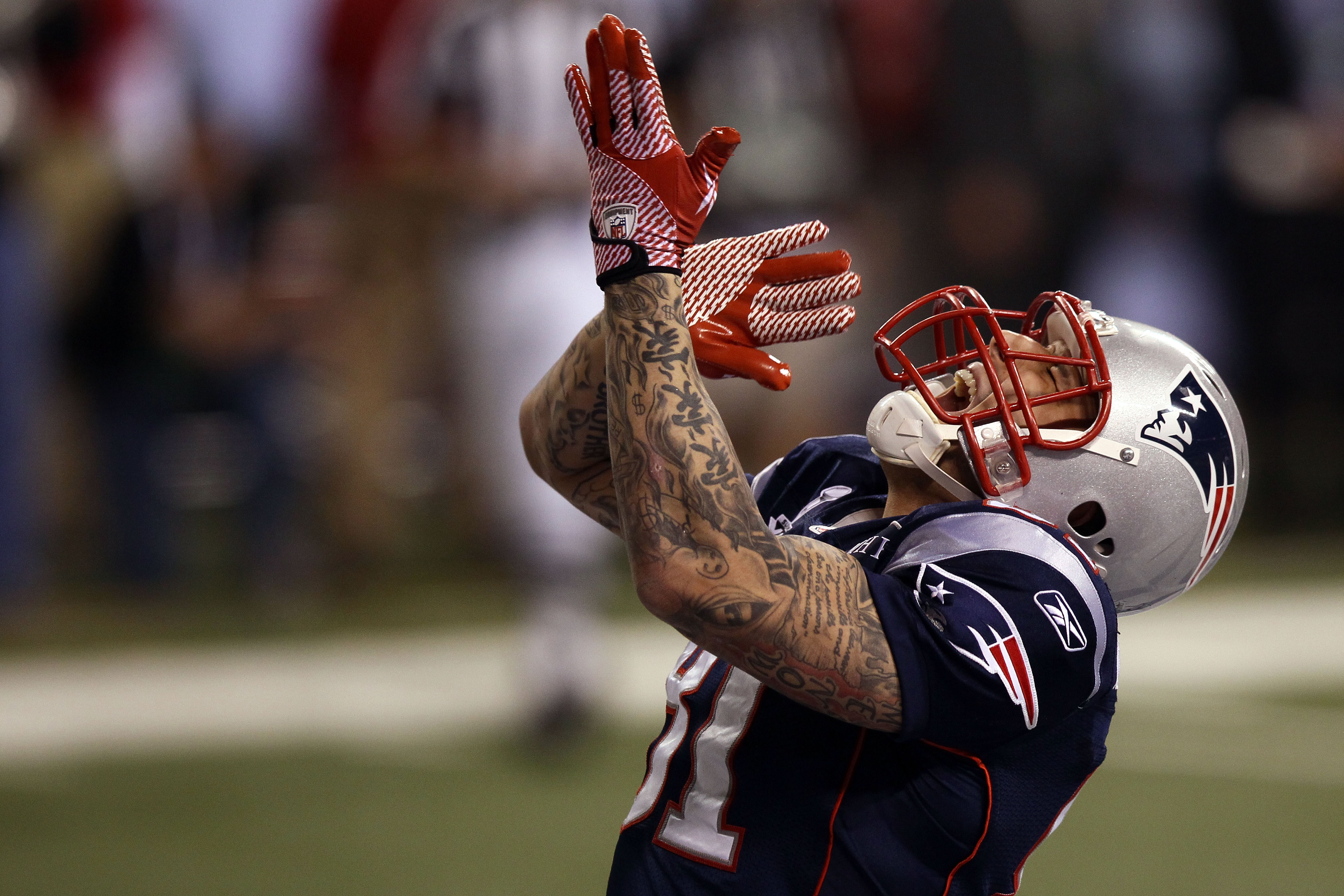 Aaron Hernandez of the New England Patriots celebrates a 12-yard touchdown in the third quarter against the New York Giants during Super Bowl XLVI at Lucas Oil Stadium in Indianapolis, Indiana, on February 5, 2012. | Source: Getty Images