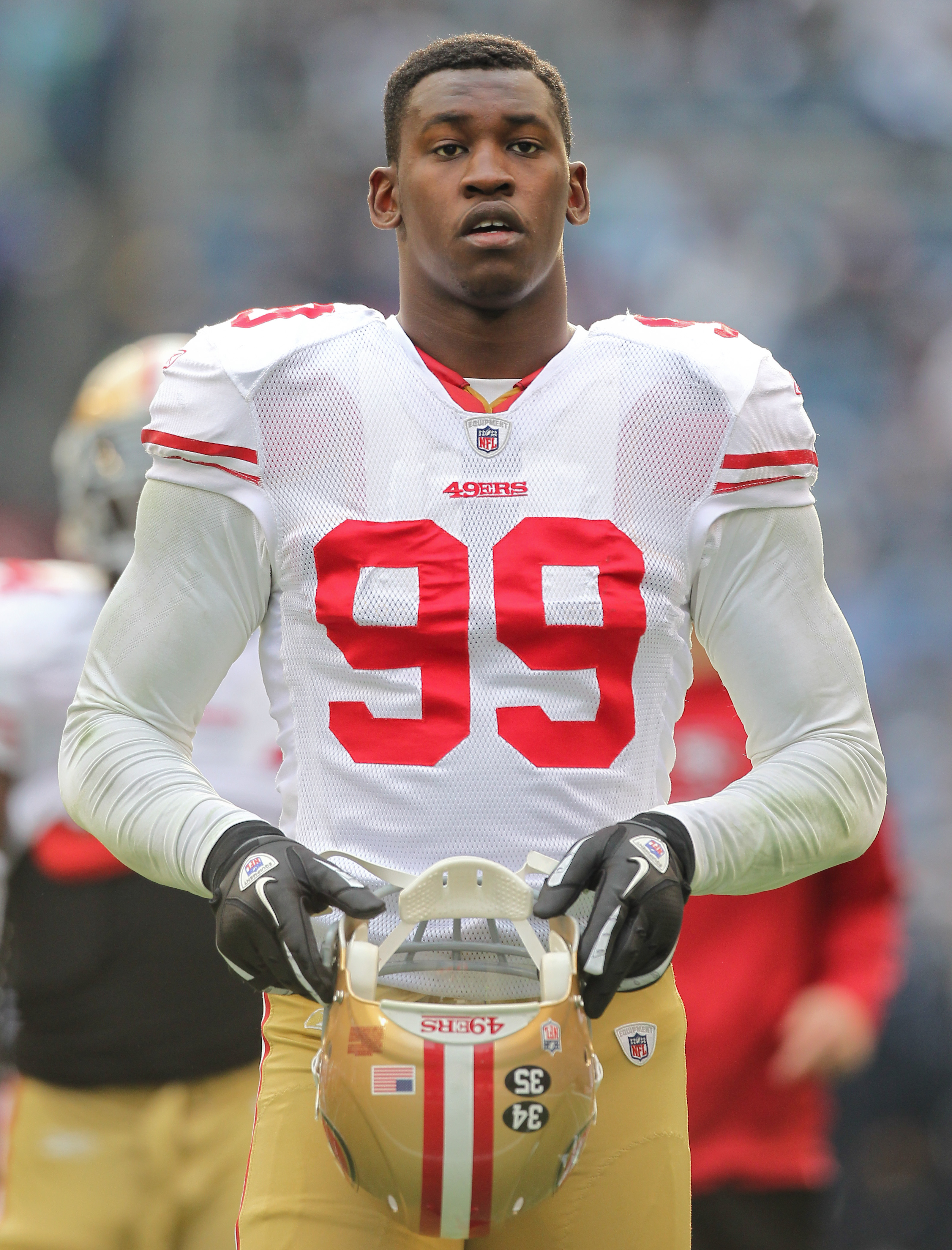 Aldon Smith #99 of the San Francisco 49ers looks on prior to the game against the Seattle Seahawks on December 24, 2011 | Source: Getty Images