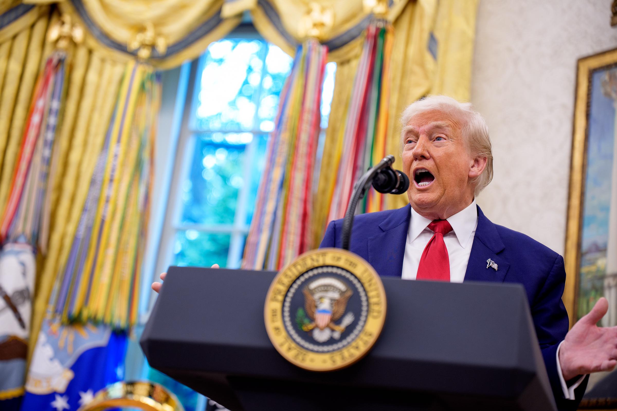 President Donald Trump speaks during a swearing in ceremony for interim U.S. Attorney for Washington, D.C. Jeanine Pirro in the Oval Office of the White House on May 28, 2025, in Washington, DC. | Source: Getty Images