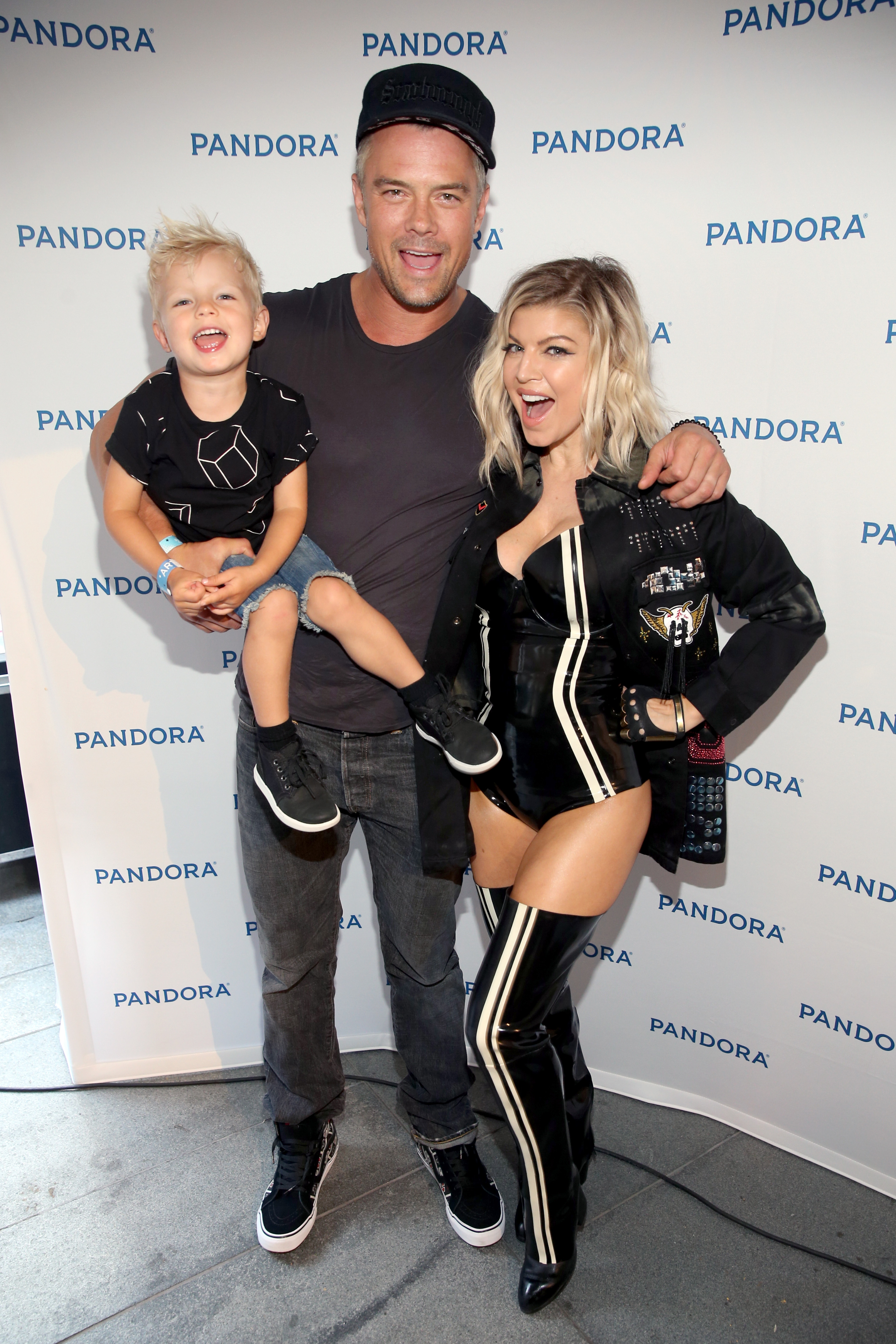 Josh Duhamel and Fergie with their son at the Pandora Summer Crush on August 13, 2016, in Los Angeles, California. | Source: Getty Images