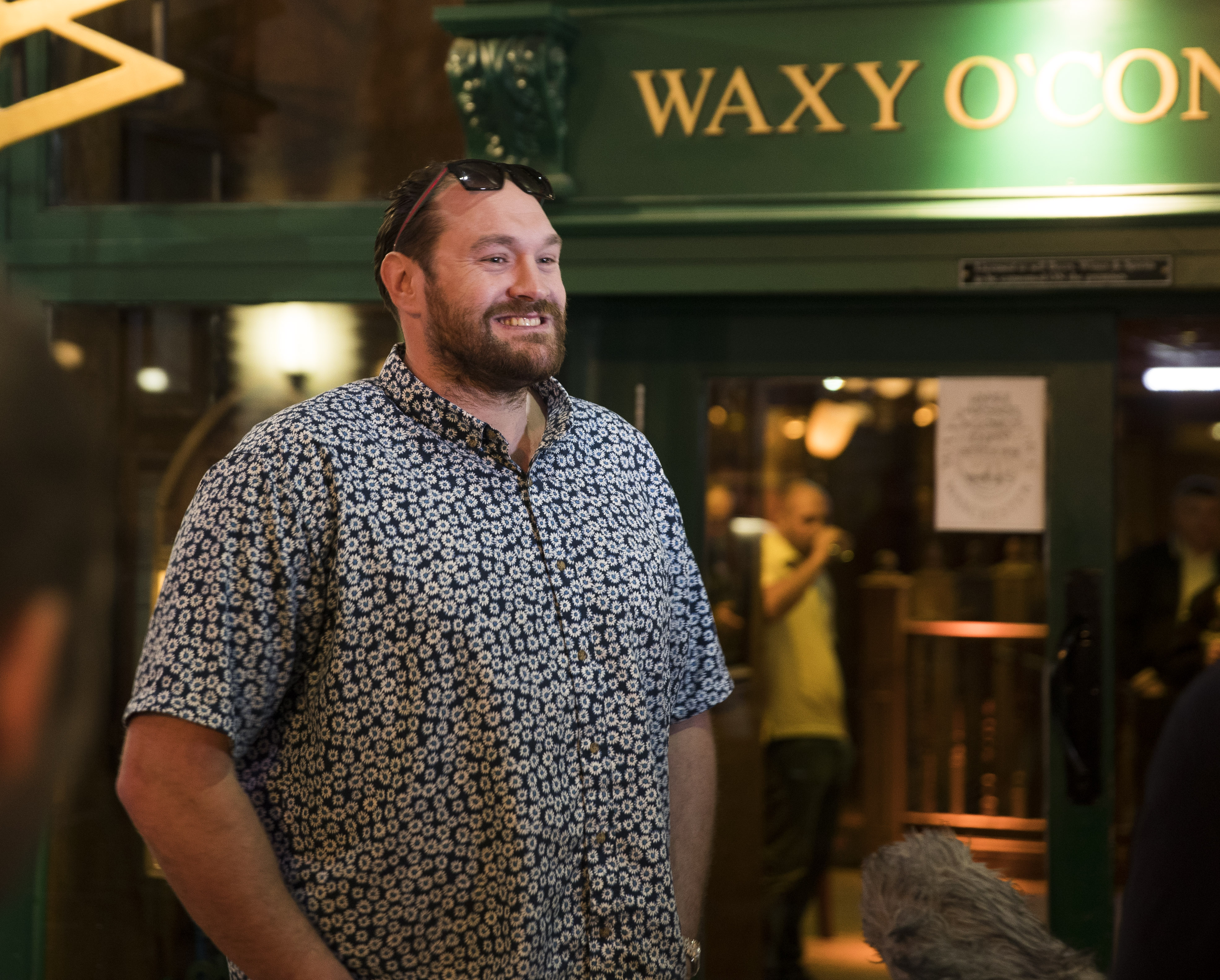 Tyson Fury smiled for cameras as he attended Terry Flanagan's public workout at The Printworks in Manchester, England, on April 5, 2017. Nearly 17 months had passed since Fury defeated Wladimir Klitschko to become heavyweight world champion, and he remained absent from the ring as his weight increased considerably during a turbulent period in his personal life.