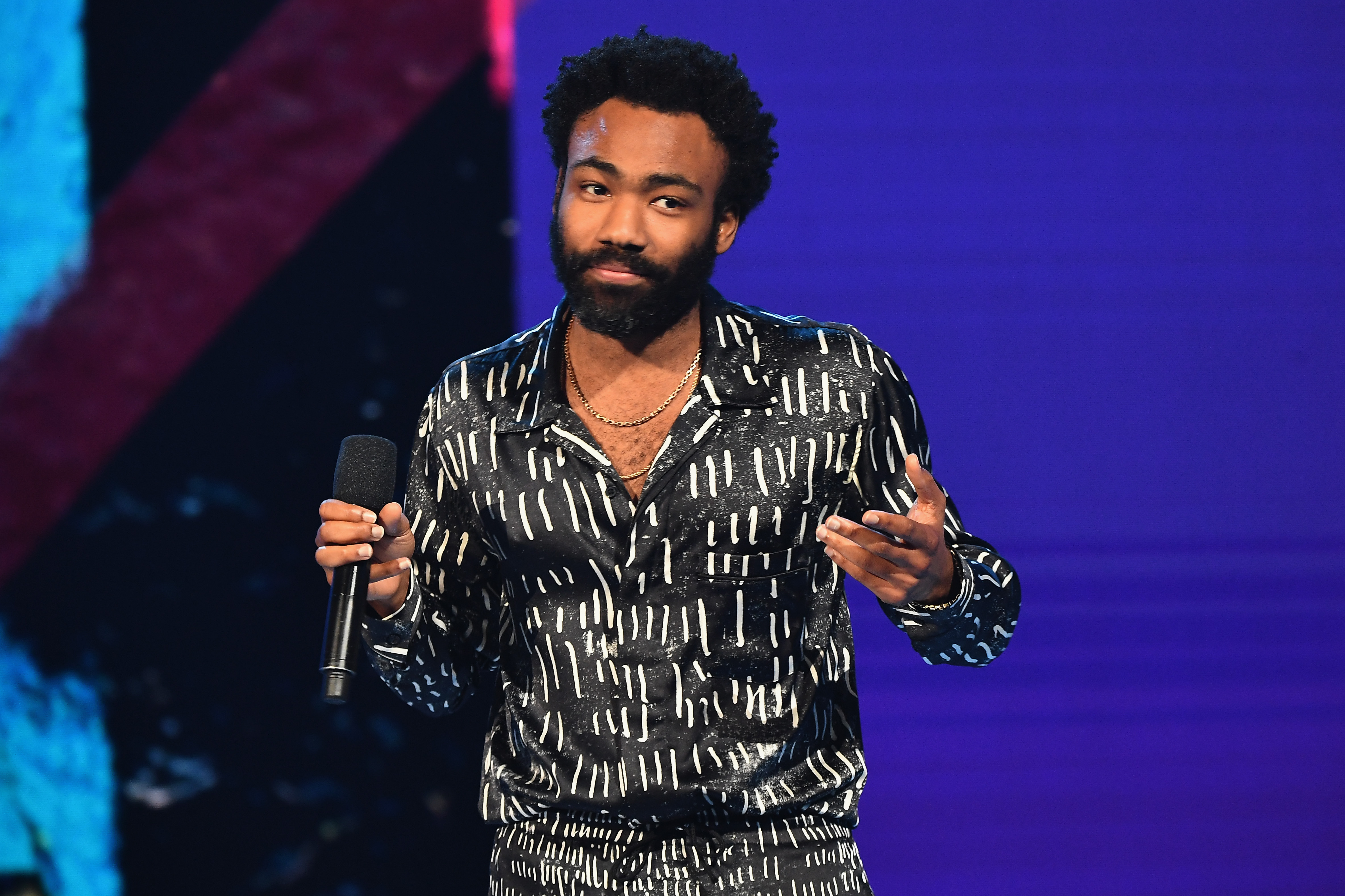 Donald Glover speaks onstage at the BET Awards in Los Angeles, California, on June 24, 2018 | Source: Getty Images