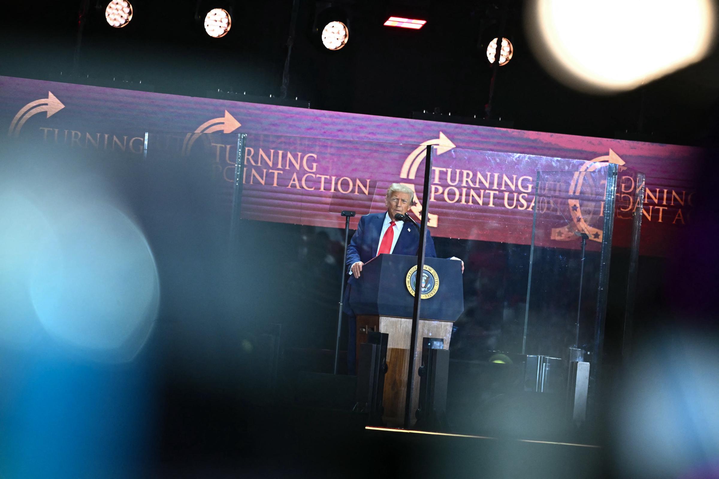 Donald Trump speaks at the public memorial service for Charlie Kirk at State Farm Stadium on September 21, 2025, in Glendale, Arizona | Source: Getty Images