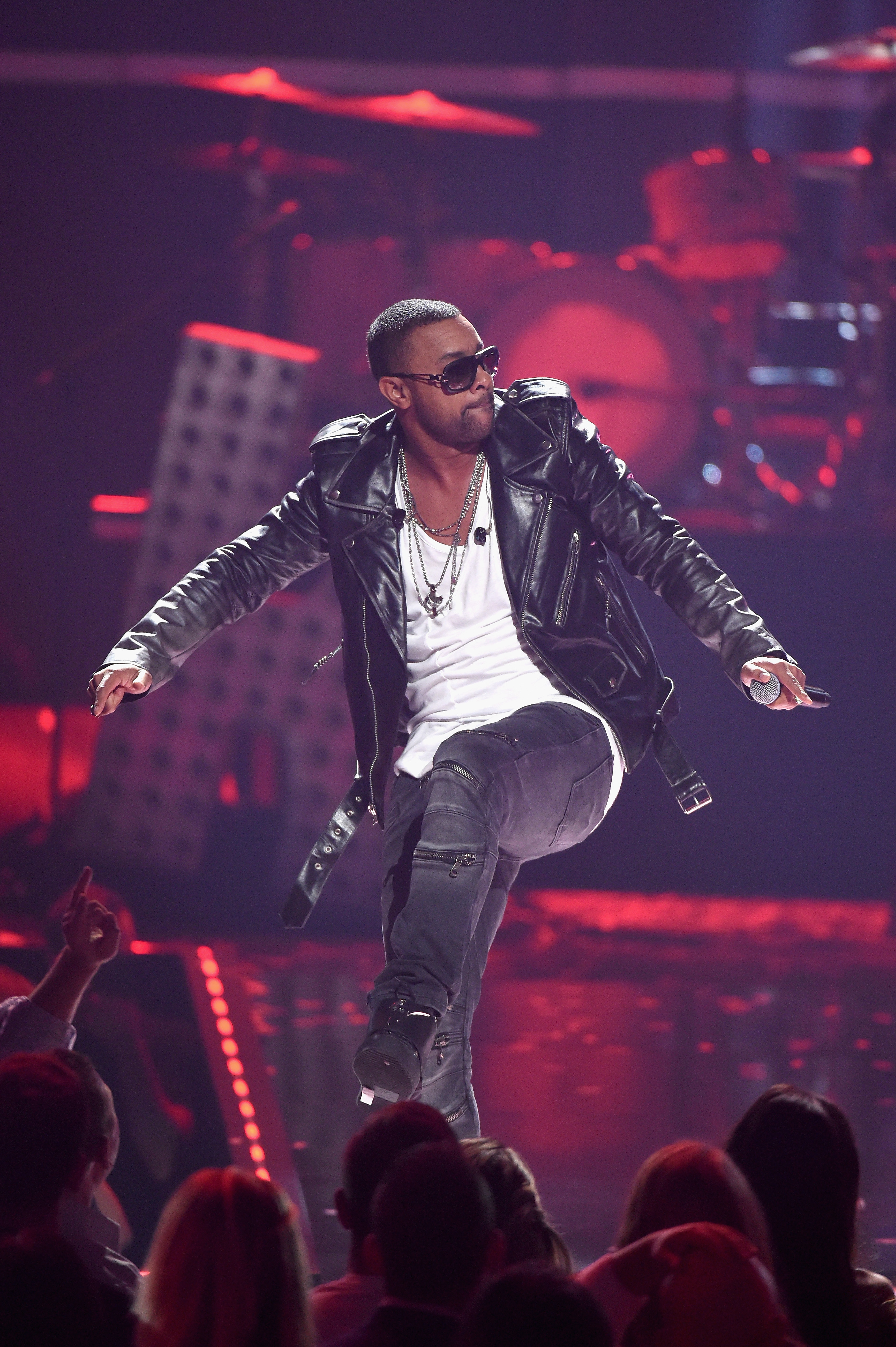Shaggy moves across the stage mid-performance during the iHeartRadio Music Festival in Las Vegas, Nevada, on September 18, 2015 | Source: Getty Images