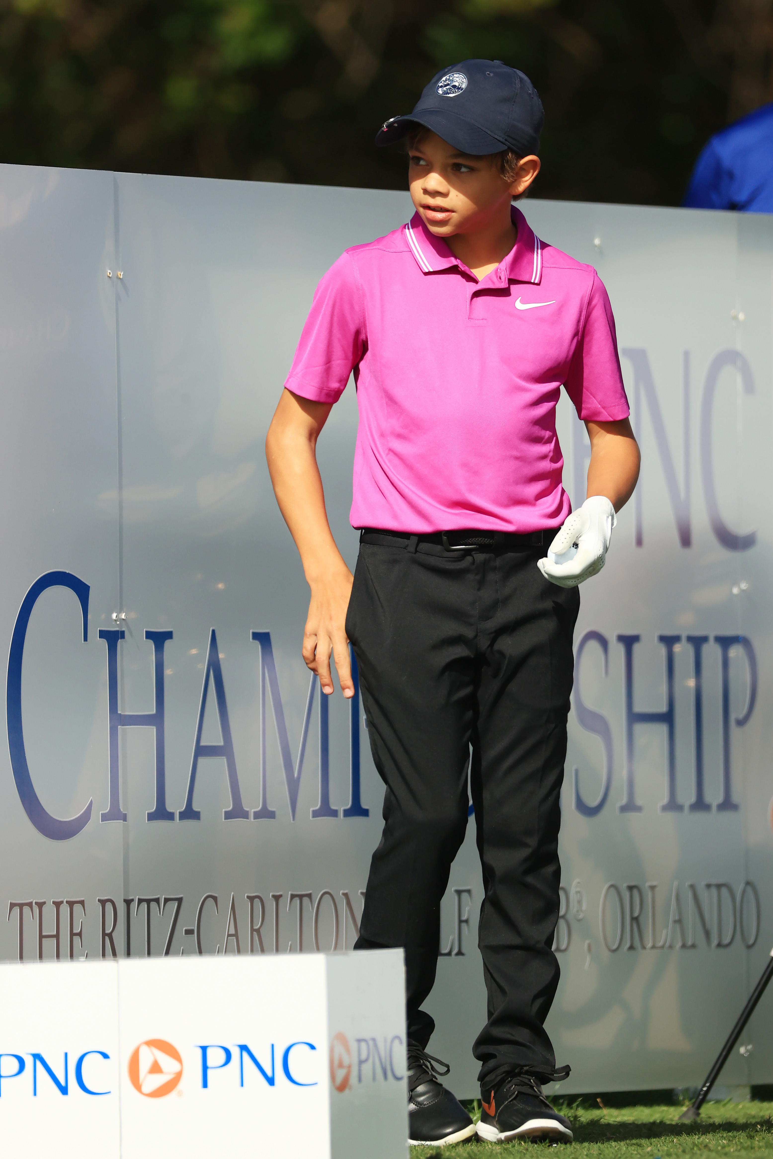 Charlie Woods looks on from the first tee during the first round of the PNC Championship at the Ritz-Carlton Golf Club Orlando on December 19, 2020, in Orlando, Florida | Source: Getty Images