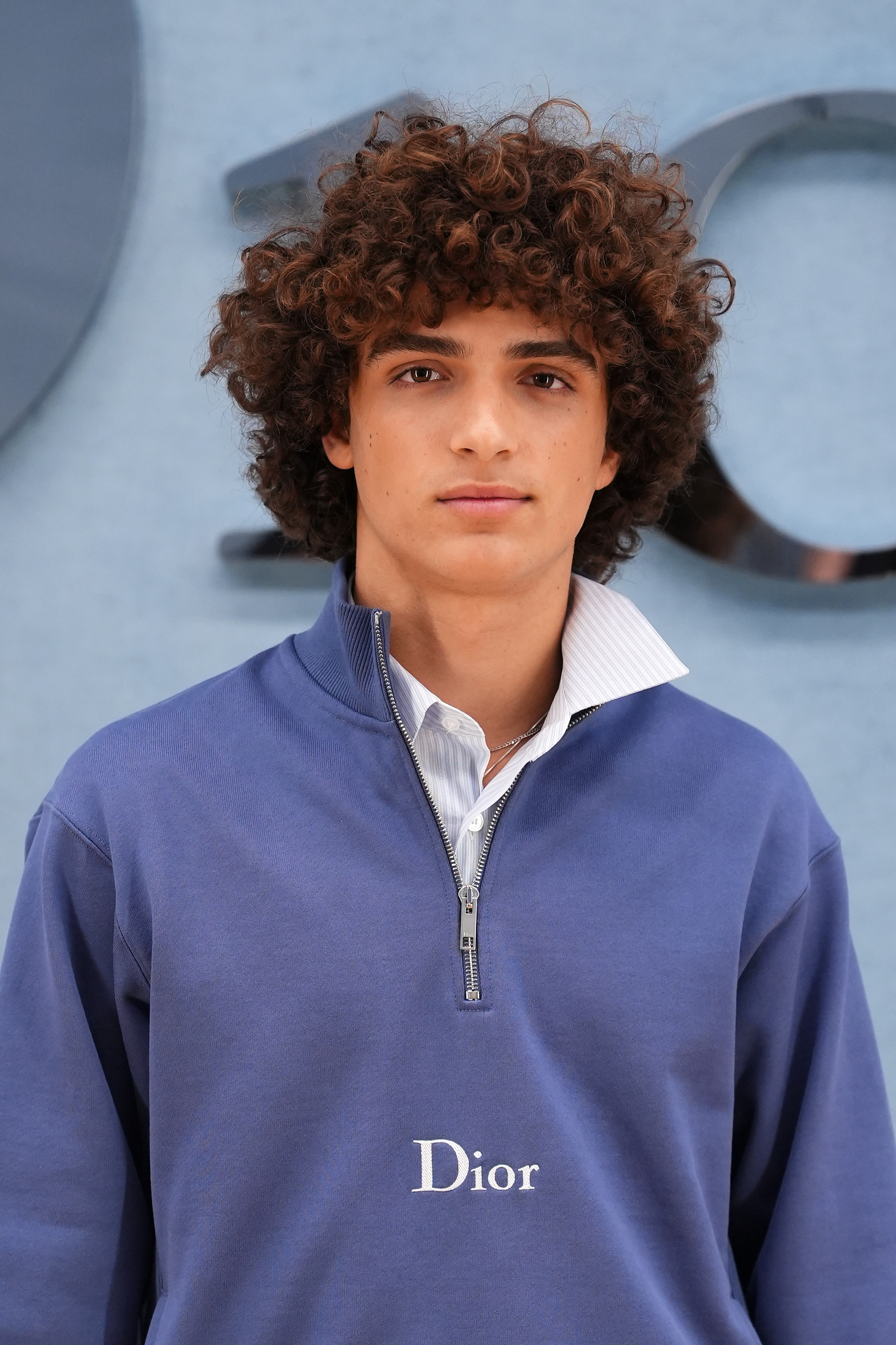 Levi McConaughey at the Dior Homme's Menswear Ready-to-wear Spring-Summer 2026 collection fashion show during Paris Fashion Week in Paris, on June 27, 2025. | Source: Getty Images