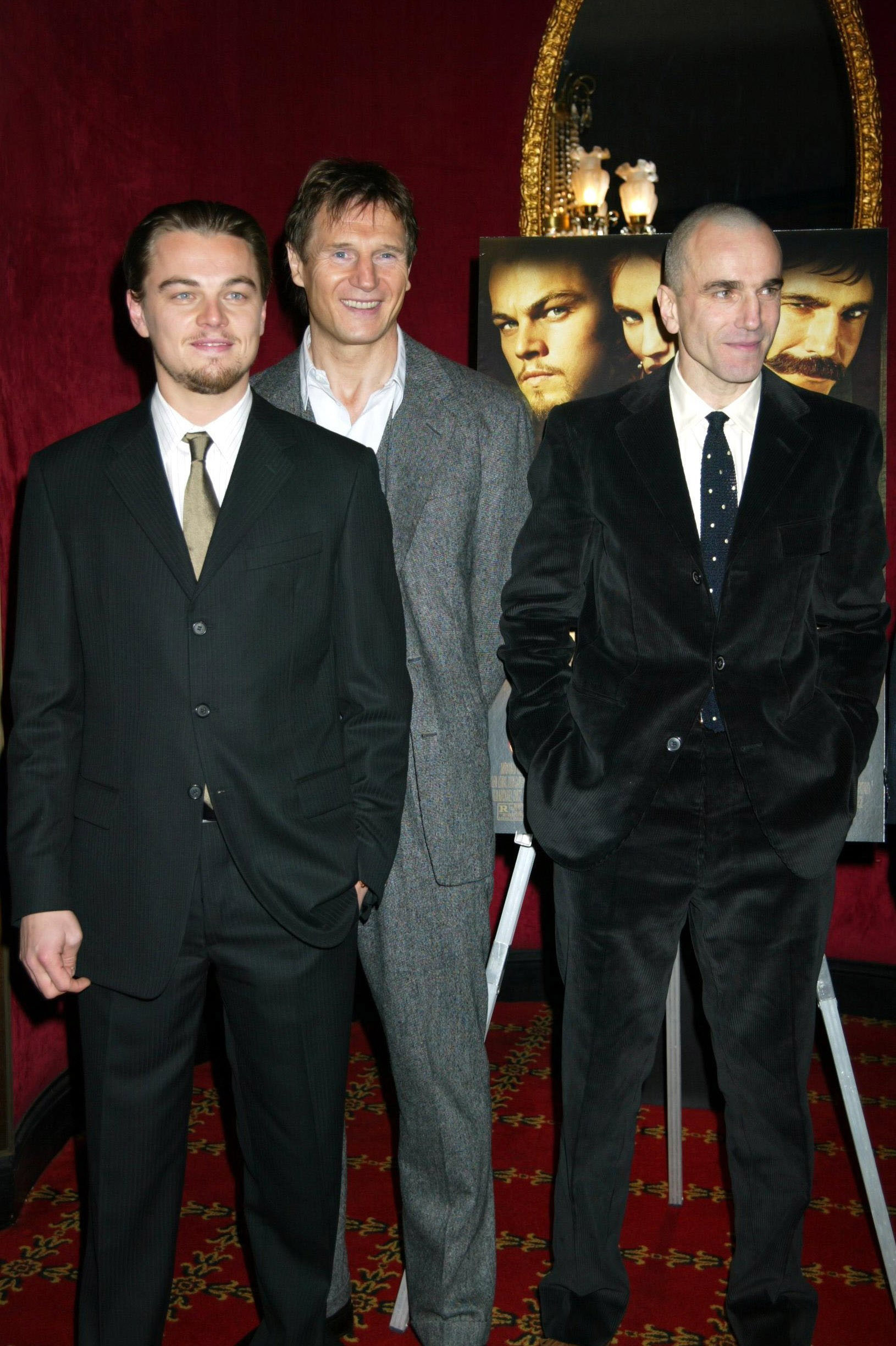 Leonardo DiCaprio, Liam Neeson, and Daniel Day-Lewis during the premiere of "Gangs of New York" at the Ziegfeld Theater in New York on December 9, 2002. | Source: Getty Images