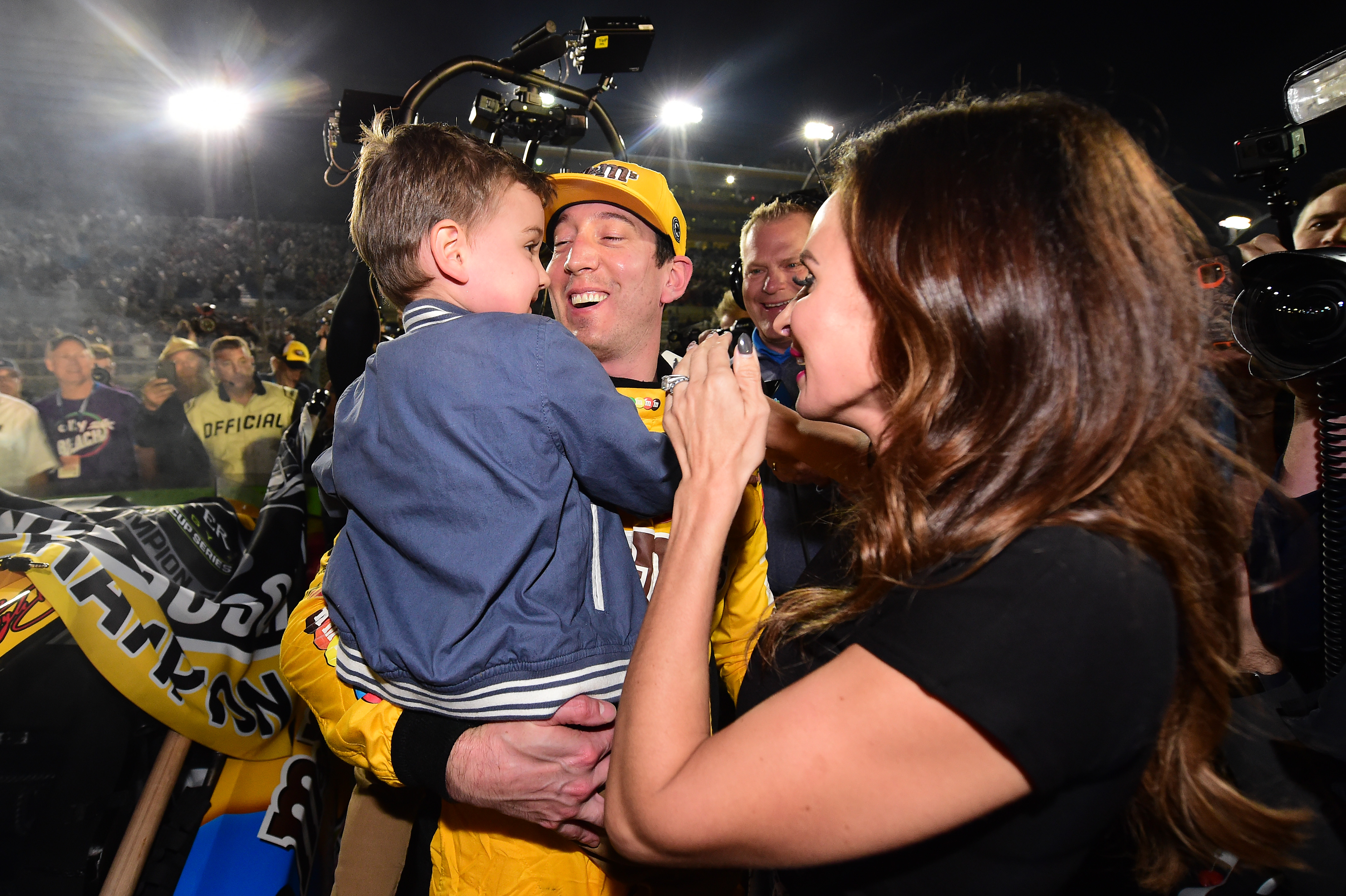 Kyle, Brexton, and Samantha Busch celebrating after Kyle won the Monster Energy NASCAR Cup Series Ford EcoBoost 400 in Homestead, Florida on November 17, 2019. | Source: Getty Images