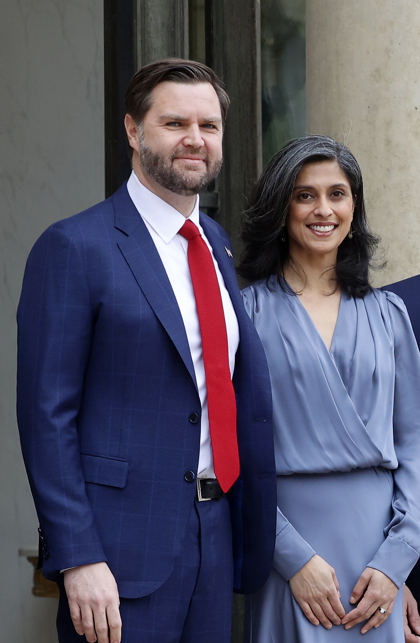 JD Vance and his wife, Usha, pose ahead of a working lunch with French President Emmanuel Macron and his wife, Brigitte at the AI Action Summit in Paris on February 11, 2025. | Source: Getty Images