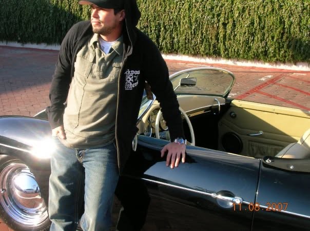 Ross Malinger poses beside a classic convertible in 2007, reflecting his growing passion for vintage cars and his transition from Hollywood to the automotive business. | Source: Ross Malinger's Facebook.