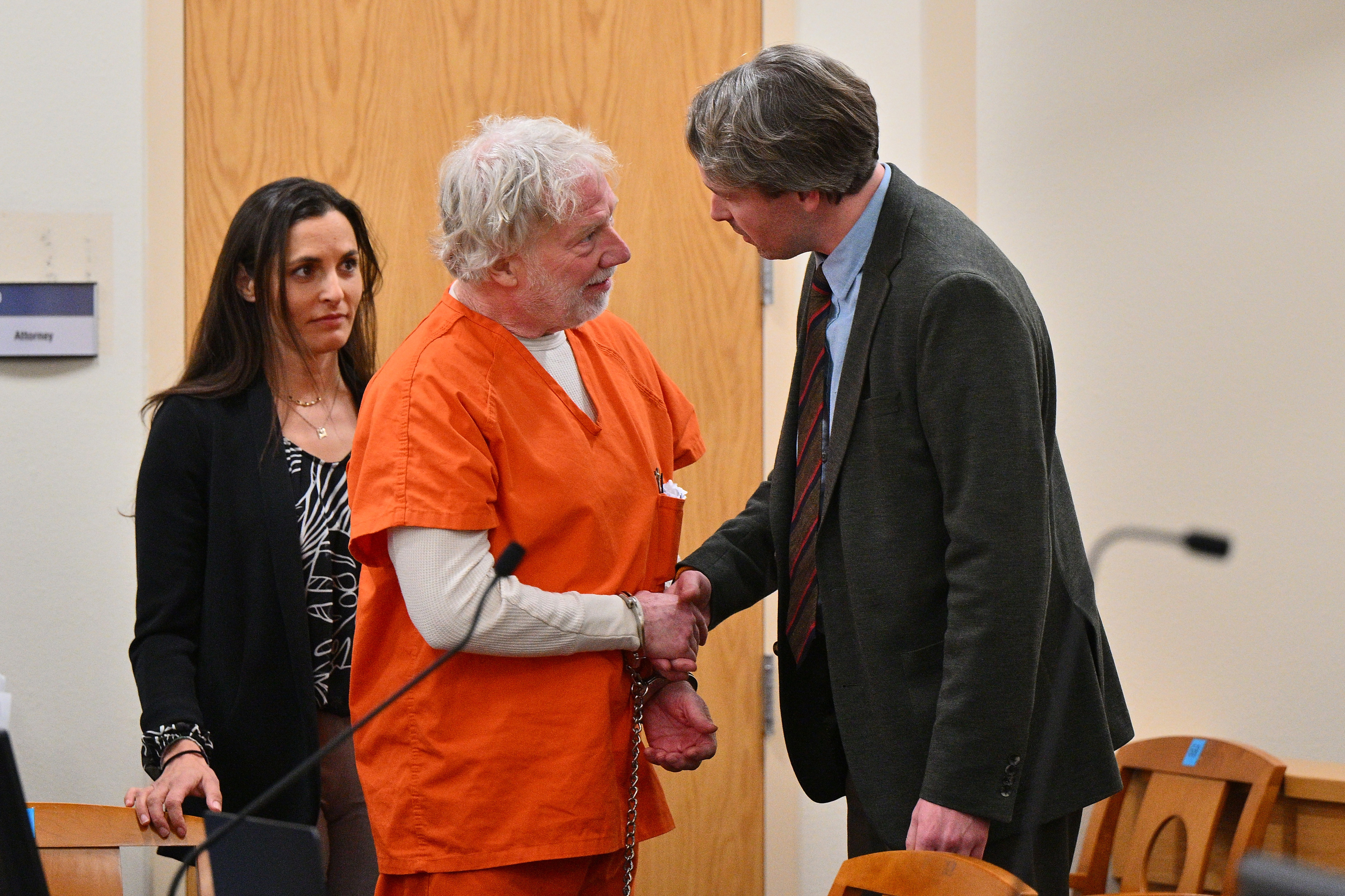 Busfield's attorneys challenged the grand jury proceedings, arguing that prosecutors had mishandled evidence and witness requests. He is pictured greeting defense attorney Christopher Allen Dodd before a court hearing in Albuquerque on January 20, 2026. | Source: Getty Images
