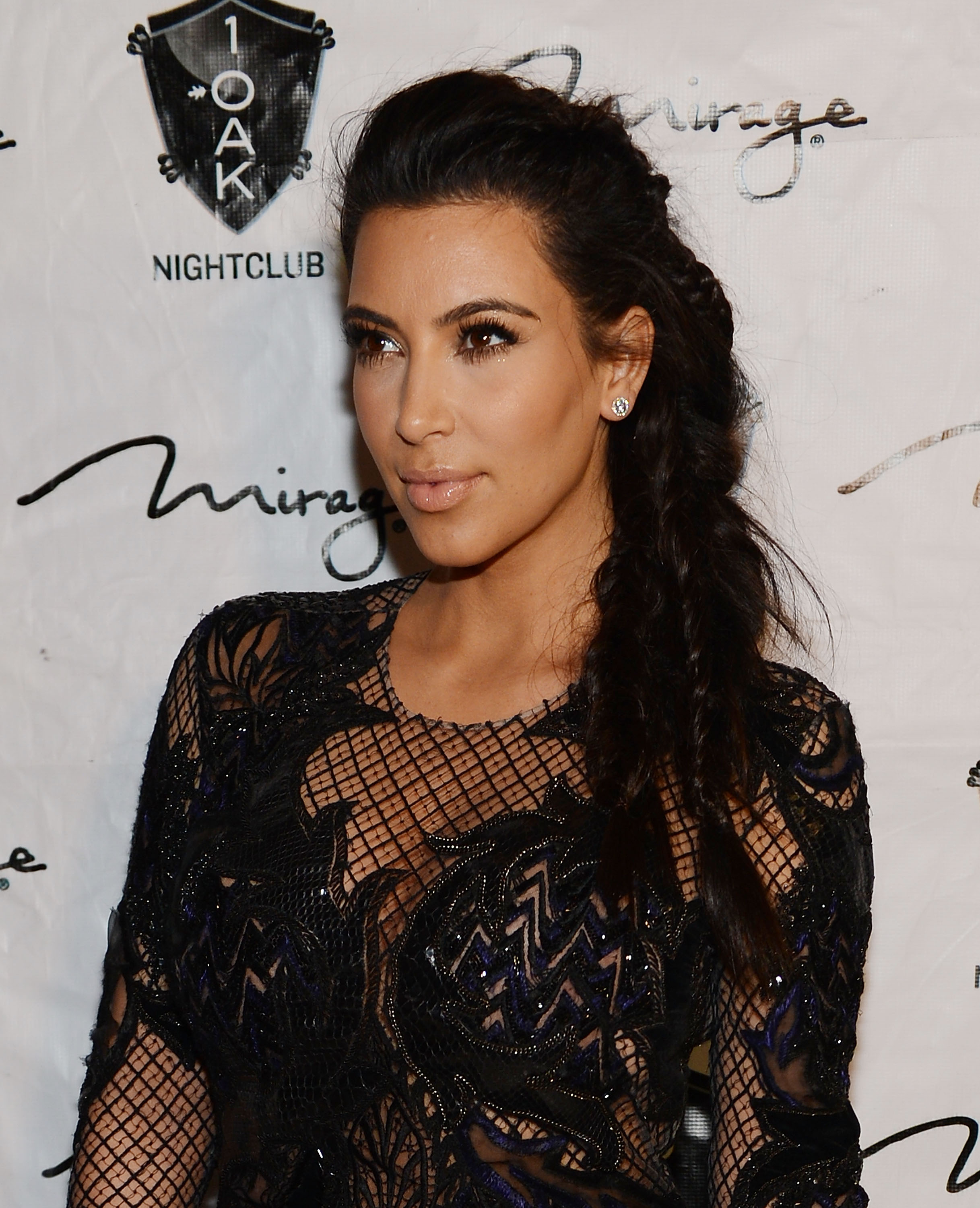 Kim Kardashian, 32, had an angular facial contour, defined by sharp cheekbone highlights, and a slim nose bridge, while arriving for the New Year's Eve countdown at 1 OAK Nightclub at The Mirage Hotel & Casino on December 31, 2012, in Las Vegas, Nevada.