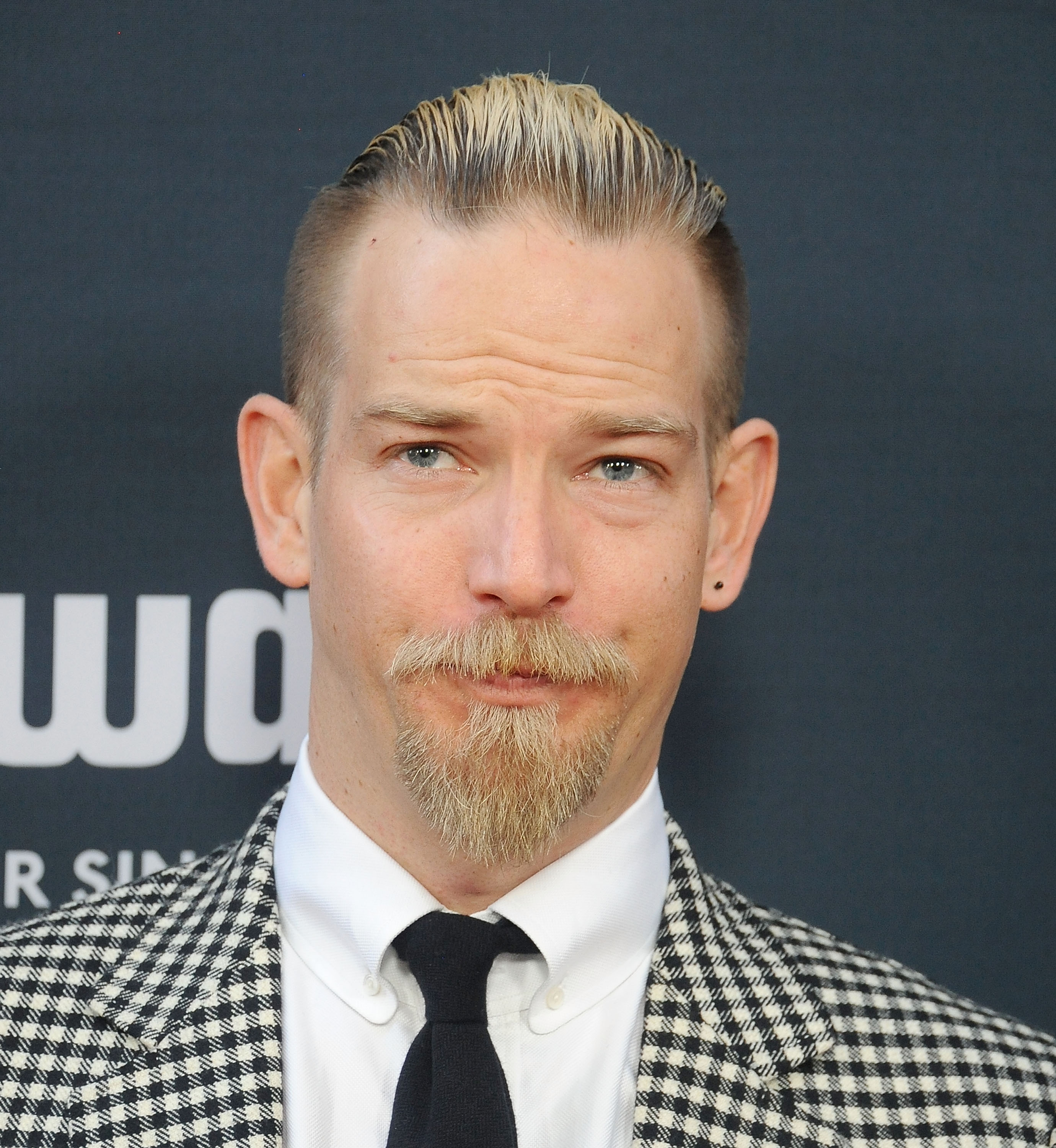 Sean Brosnan arrives at the premiere of The Weinstein Company's "No Escape" at Regal Cinemas L.A. Live on August 17, 2015, in Los Angeles, California. | Source: Getty Images