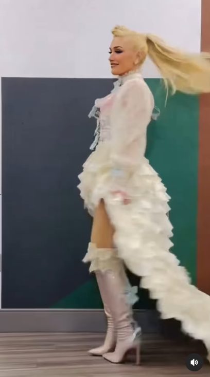 Gwen Stefani showing off her outfit | Source: Instagram/gwenstefani