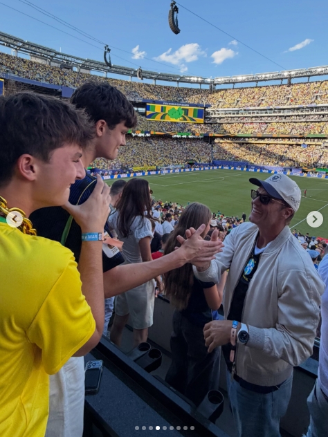 Tom Brady shared a candid moment with his sons during the FIFA World Cup final, capturing the trio enjoying the match from the stands. As the photos circulated online, many observers focused on the family's shared jawline instead of the action unfolding on the field, noting how closely Brady and his sons resembled one another. | Source: Instagram/tombrady