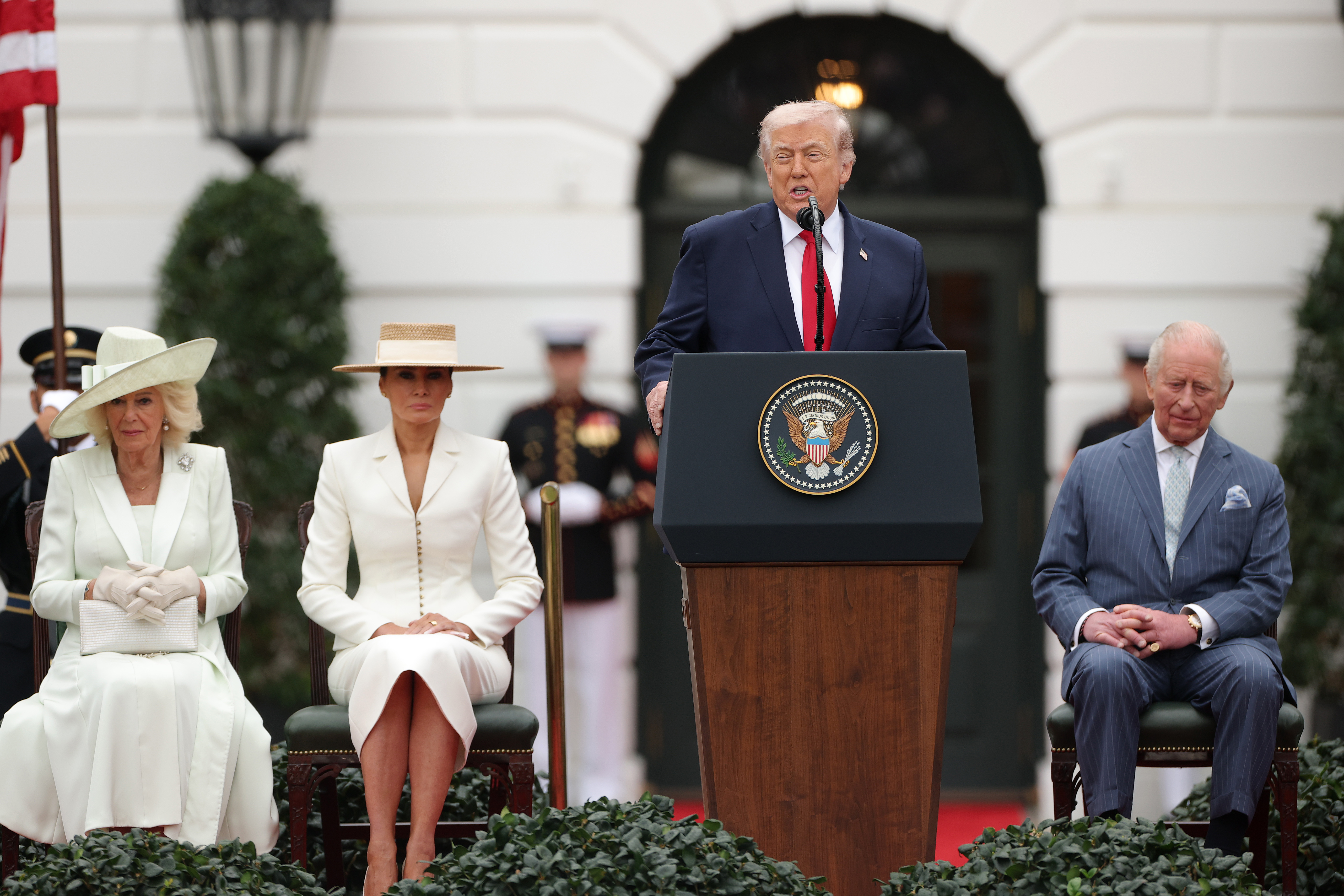 Donald Trump speaks as Queen Camilla, Melania, and King Charles III look on during an arrival ceremony on the South Lawn of the White House on April 28, 2026 | Source: Getty Images