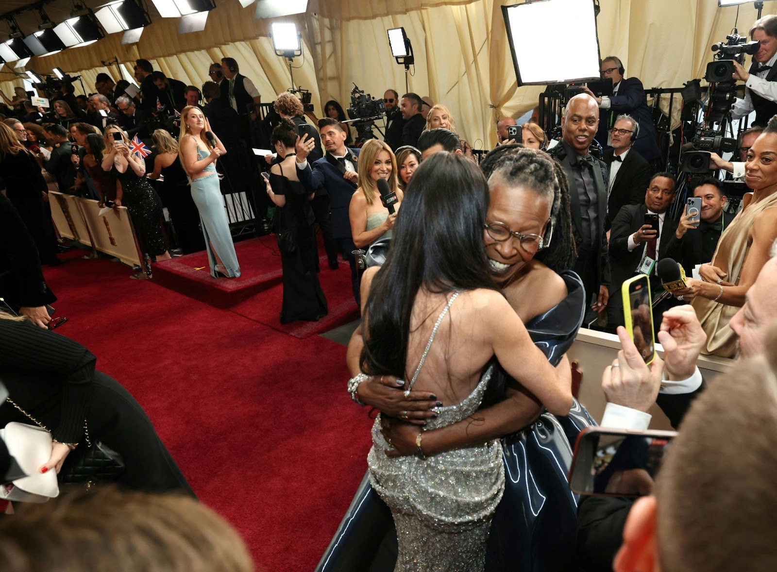 Demi Moore and Whoopi Goldberg hugging at the 97th Annual Academy Awards in Hollywood, California, on March 2, 2025 | Source: Getty Images