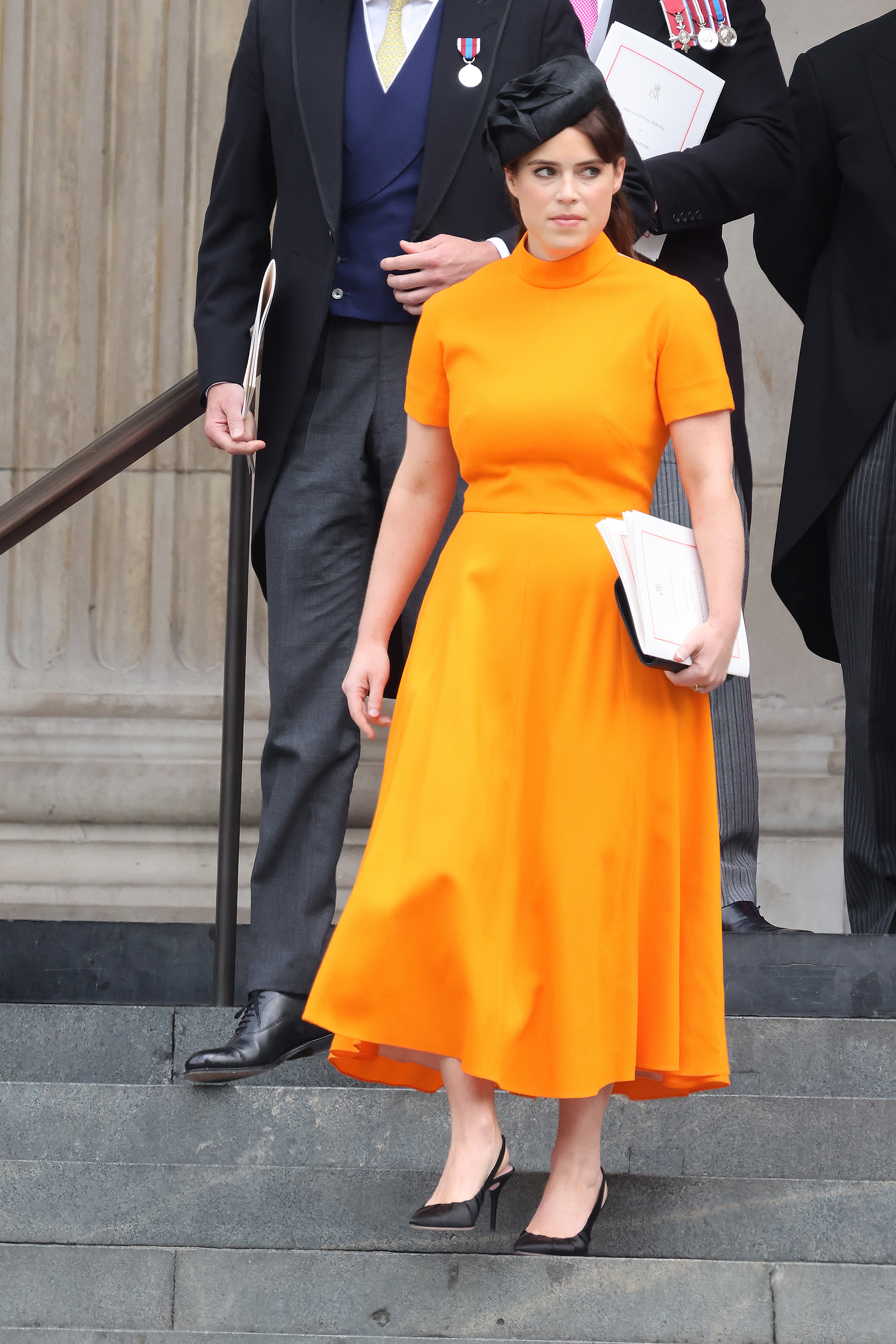 Some of Eugenie's most memorable appearances have shown her embracing bold shades while keeping the silhouettes clean and unfussy. That combination anticipated the more pared-back direction fashion watchers would later identify in her wardrobe.
