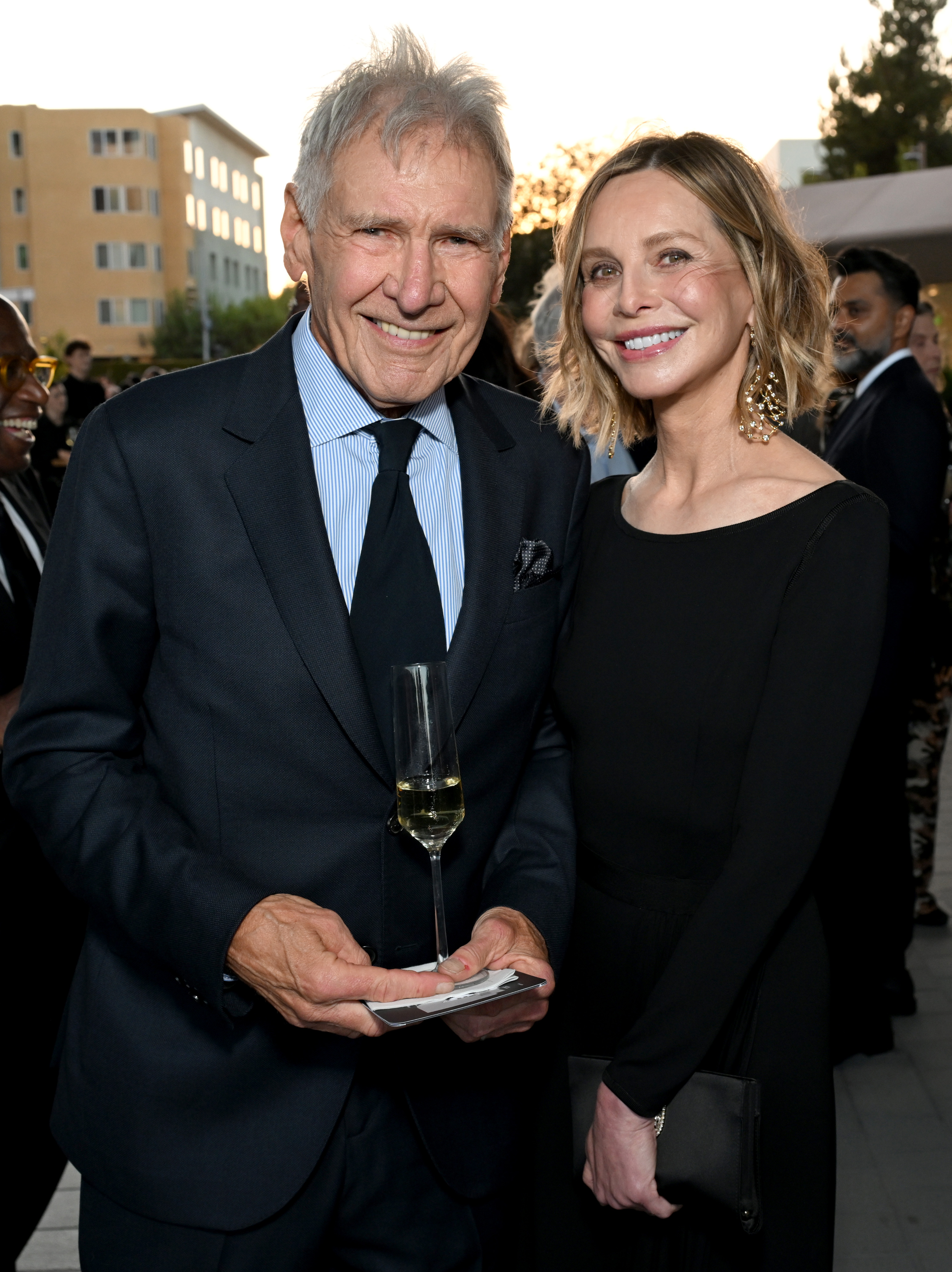 Harrison Ford and Calista Flockhart shared a smile as they stopped for a photo together. The couple joined the familiar faces gathered for the museum's opening night. | Source: Getty Images