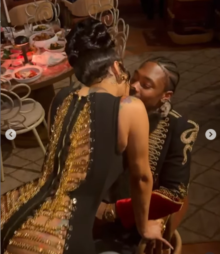 Cardi B and her son's father Stefon Diggs are captured mid-kiss, as seen from a post dated December 8, 2025. | Source: Instagram/iamcardib