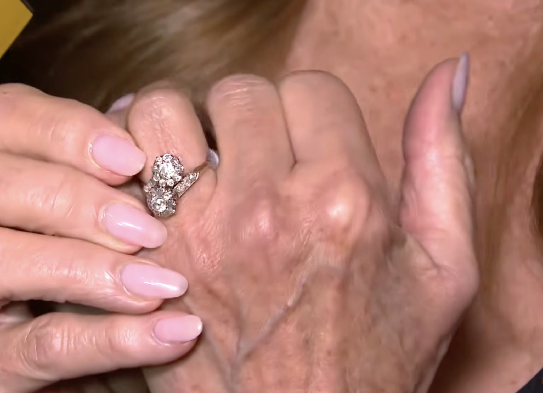 The ring's multi-stone design became the emotional centerpiece of Seymour's reveal. She said she later learned it was a "Toi et Moi" style, a romantic design with historic roots. | Source: YouTube/Entertainment Tonight