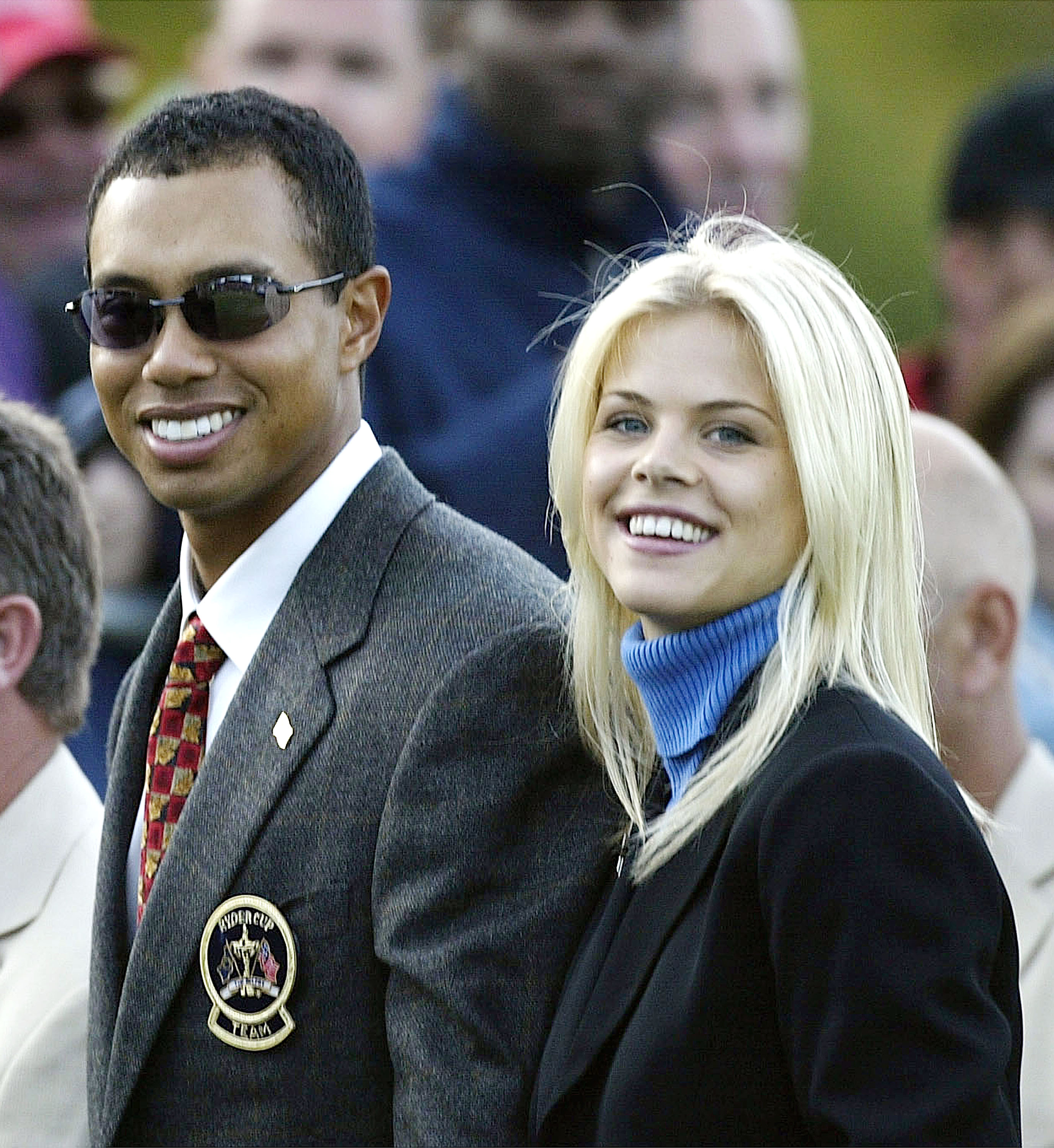 Tiger Woods poses with Elin Nordegren during the opening ceremony for the 34th Ryder Cup on September 26, 2002, in Sutton Coldfield, England | Source: Getty Images