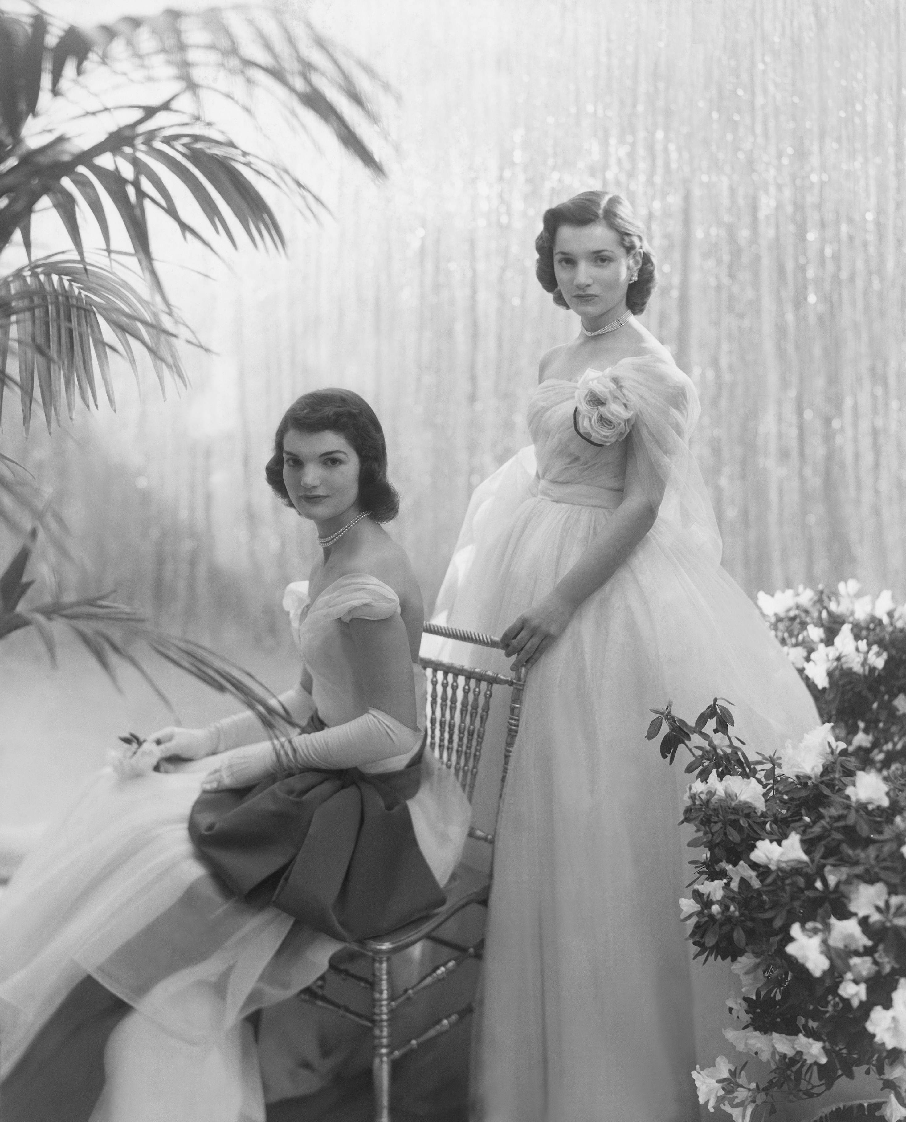 Jacqueline Kennedy Onassis and her sister, Lee Radziwill, posing for Vogue in 1951. | Source: Getty Images