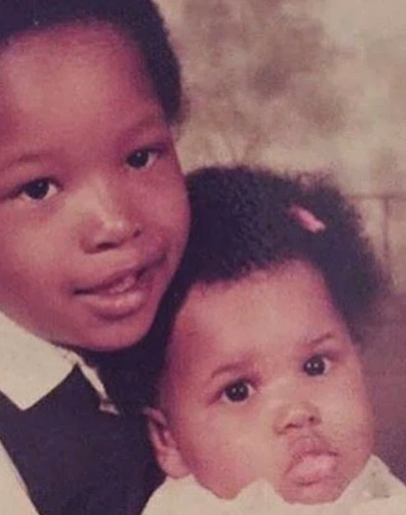 The actress poses with her younger sibling in a childhood photo | Source: Instagram/iamjhud