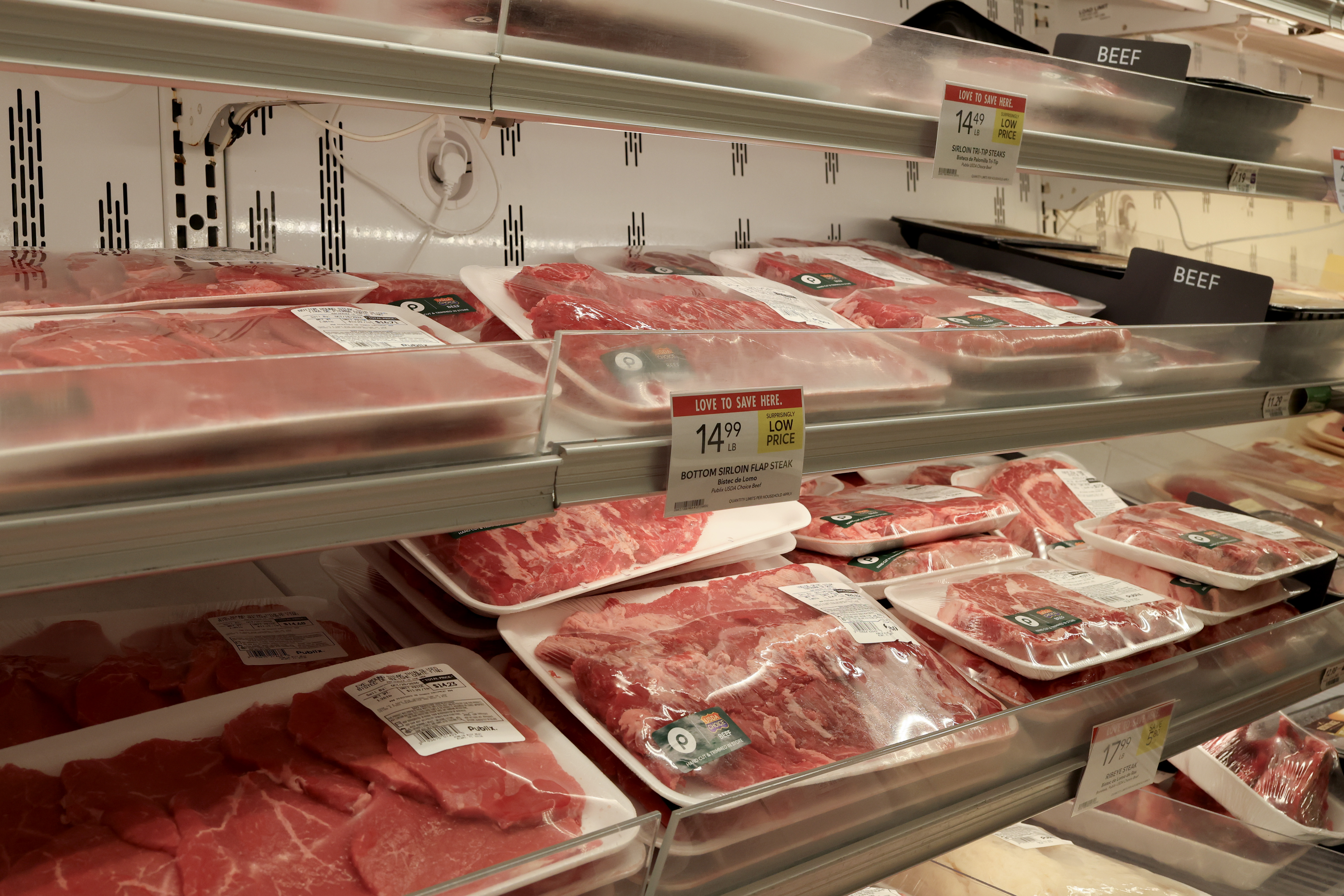 1. Packages of ground beef and other meat products are stocked inside a supermarket refrigerator. | Source: Getty Images