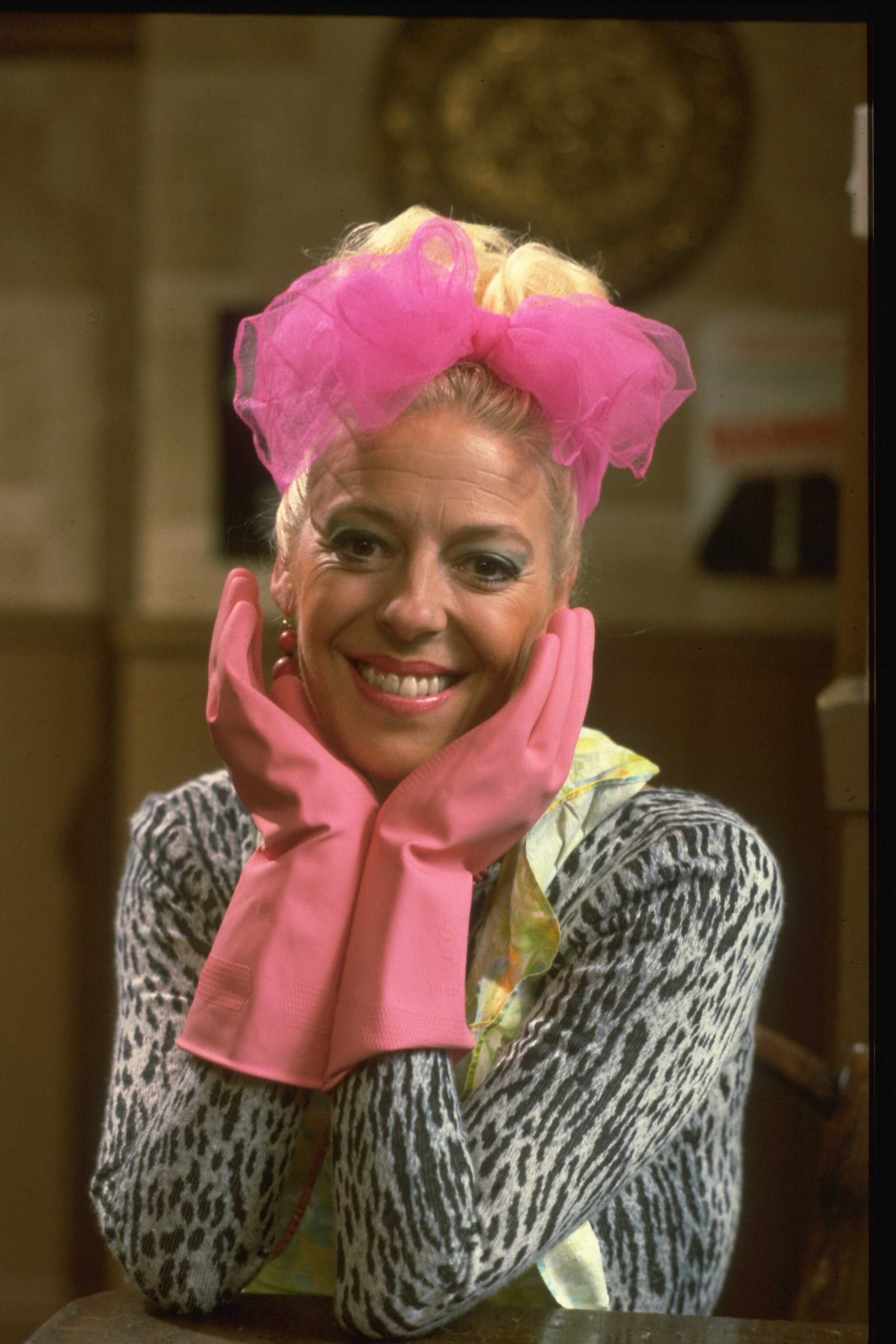 The public figure poses on the set of "Coronation Street," 1984