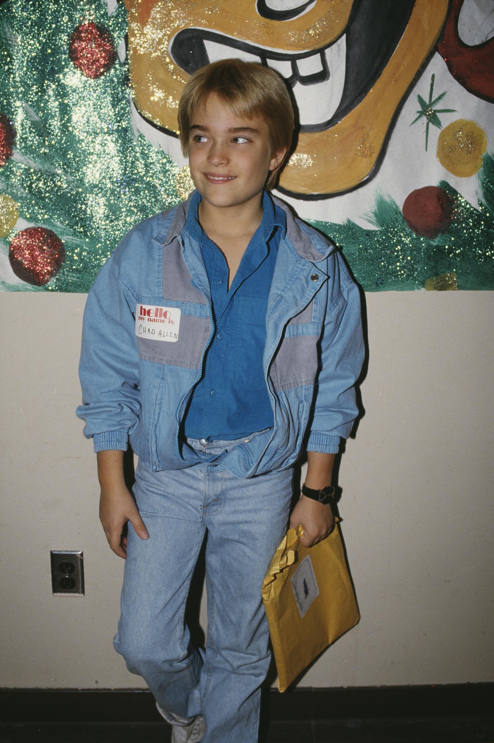 He was poised to become a teen idol early in his career. In this photo, Chad Allen posed for a portrait wearing a blue jacket over a blue shirt with denim jeans circa 1985. | Source: Getty Images