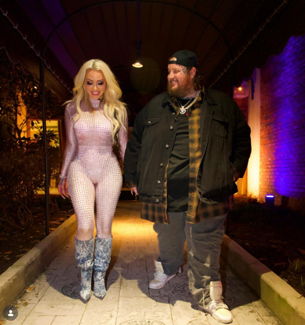 The IVF process proved to be a massive struggle for the couple as they tried to expand their family. In this photo, they posed outdoors at night on February 22, 2023. | Source: Instagram/xomgitsbunnie