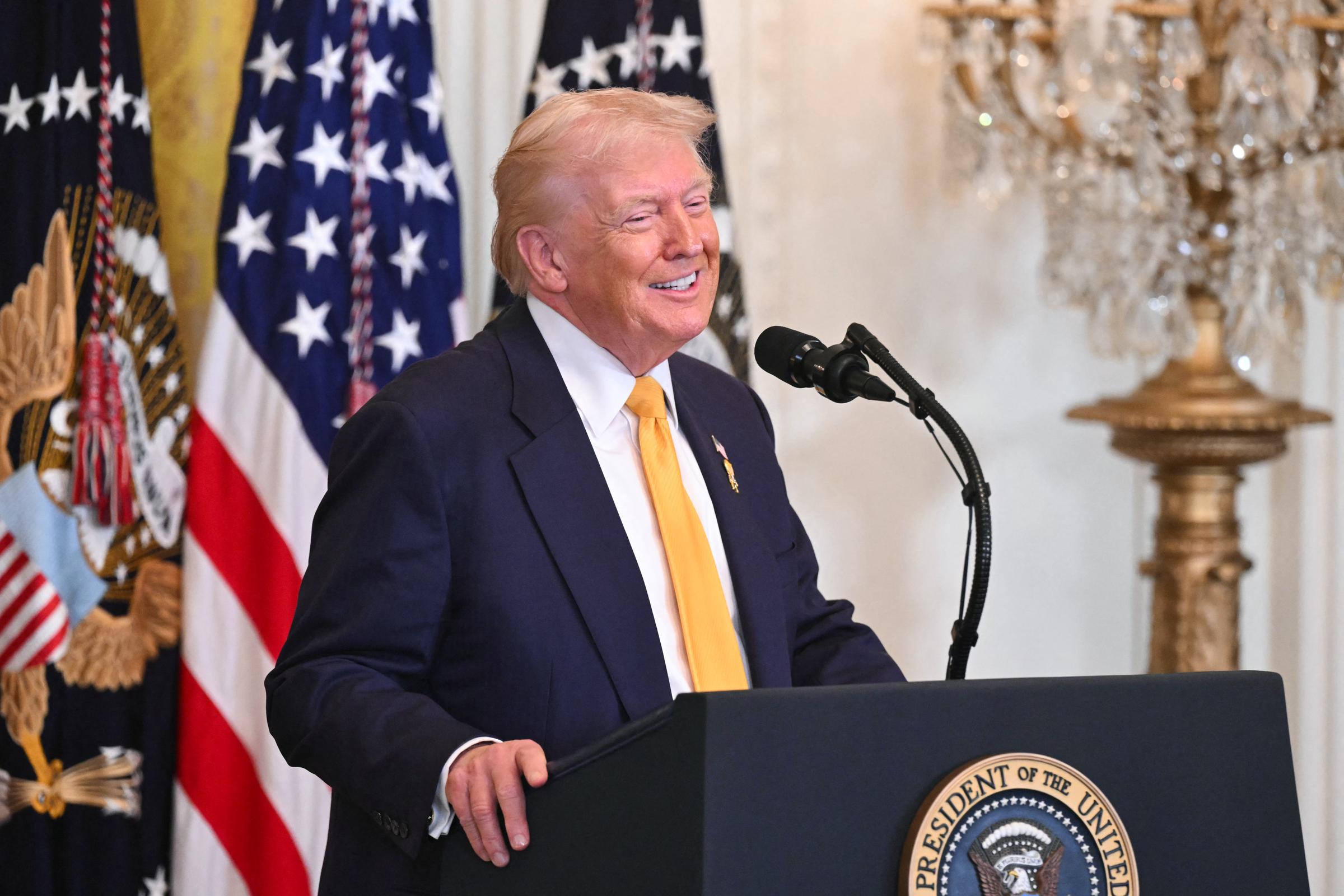 President Donald Trump speaks during a Black History Month event in the East Room of the White House on February 18, 2026 | Source: Getty Images