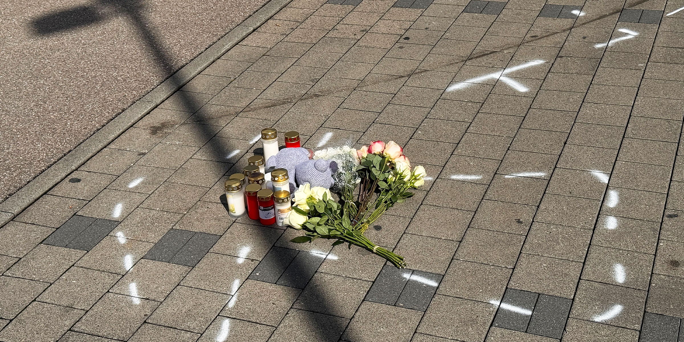 Mourners leave flowers at the scene of the incident | Source: Getty Images