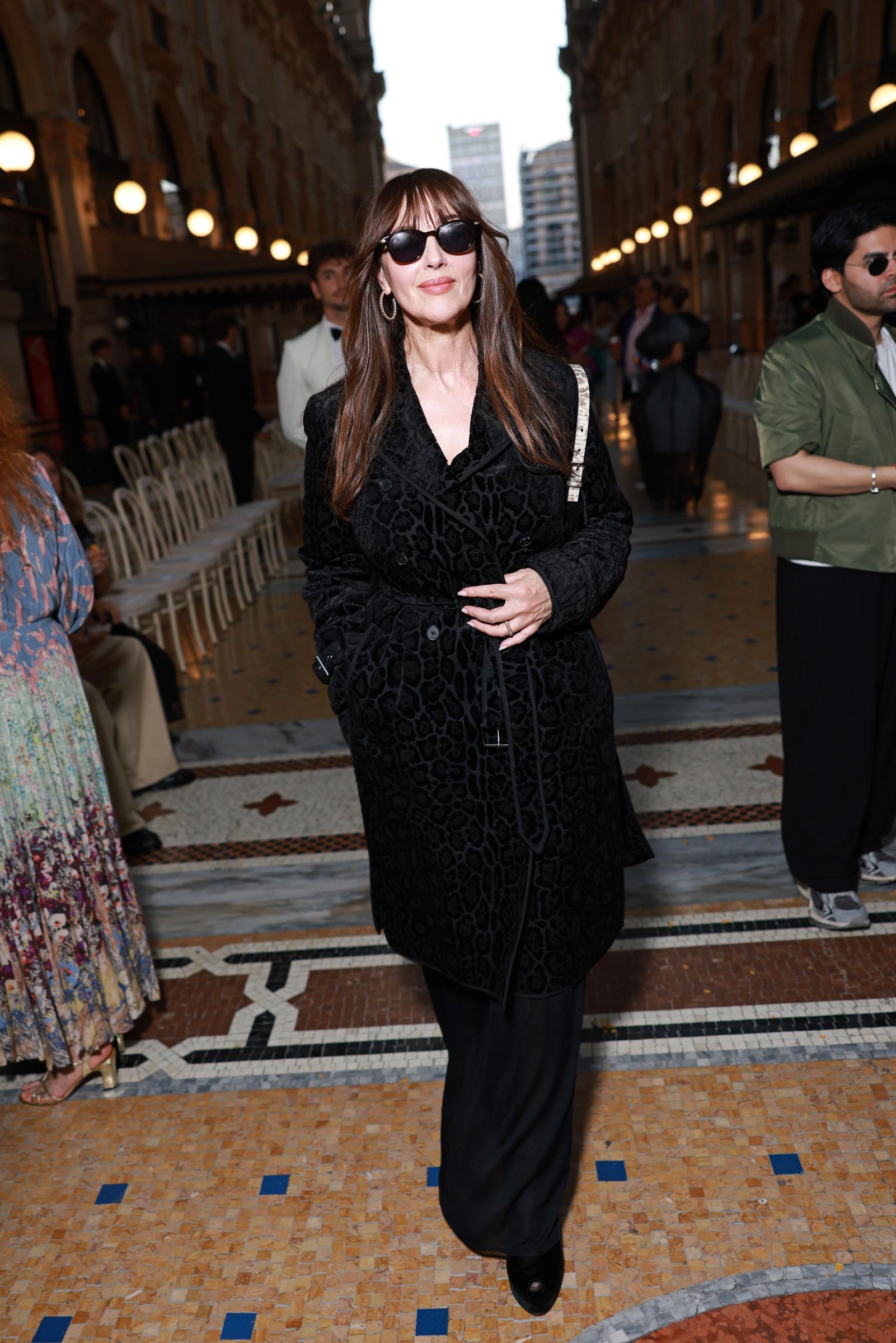 Heads turned as Monica Bellucci made her way past rows of seated guests and flashing cameras during the September 22, 2026 event. Radiating calm confidence, the Italian actress offered a faint smirk toward photographers while navigating the bustling runway walkway, proving once again why she remains an enduring fashion icon. | Source: Getty Images