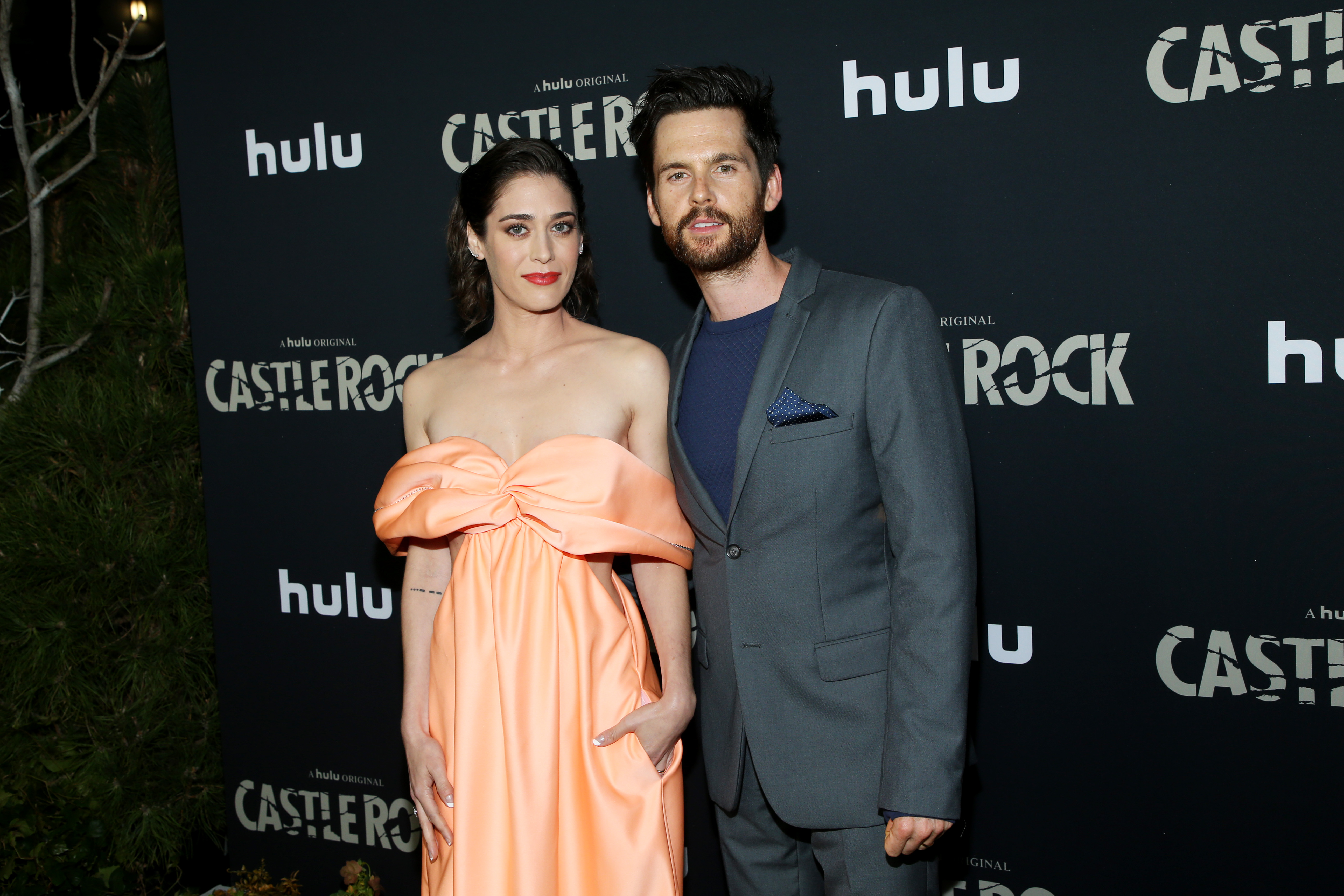 Lizzy Caplan and Tom Riley attend the premiere of Hulu's "Castle Rock" Season 2 at AMC Sunset 5 on October 14, 2019 in Los Angeles, California. | Source: Getty Images