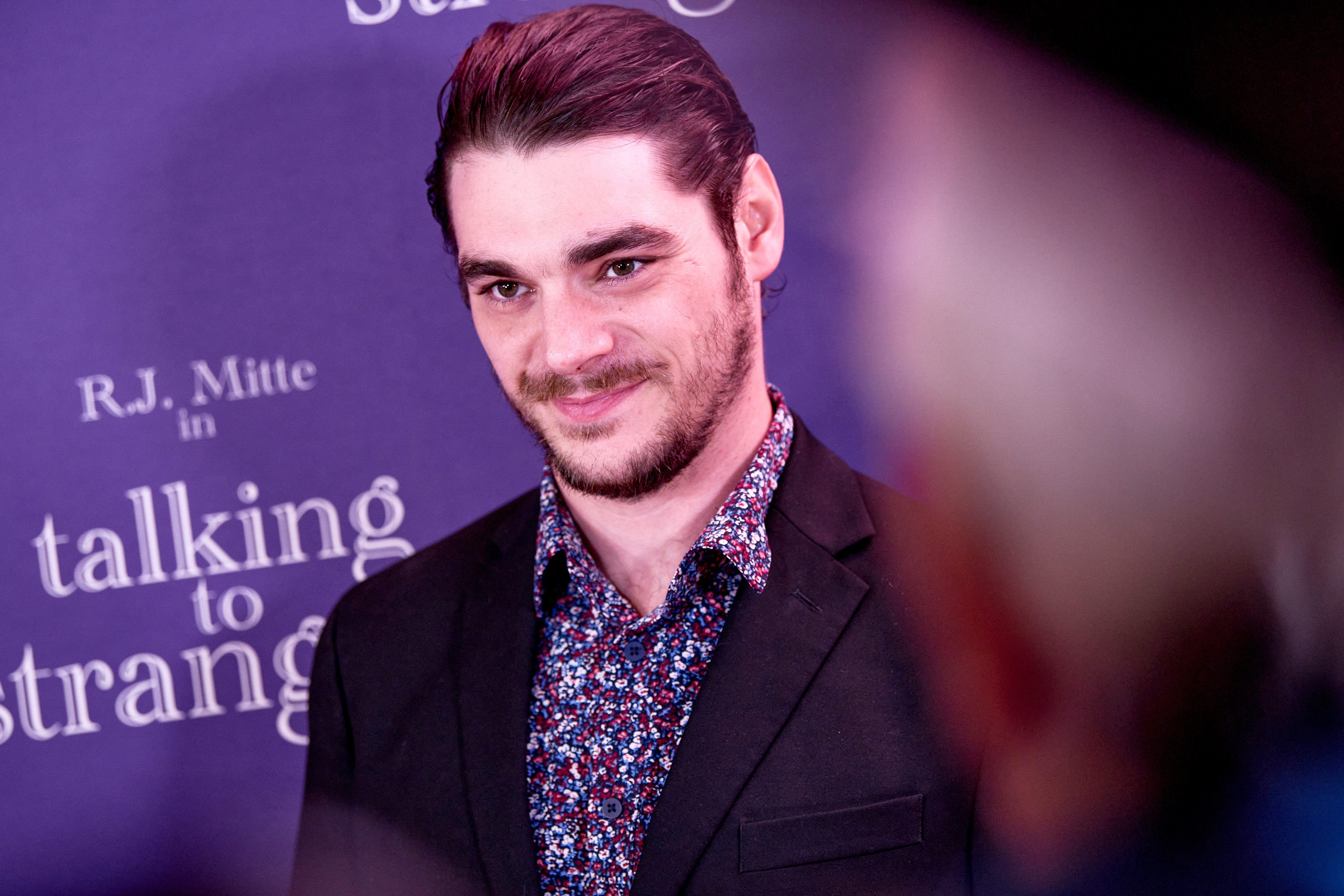 RJ Mitte makes a public appearance at the "Talking to Strangers" screening in Beverly Hills, California, on September 30, 2026. | Source: Getty Images