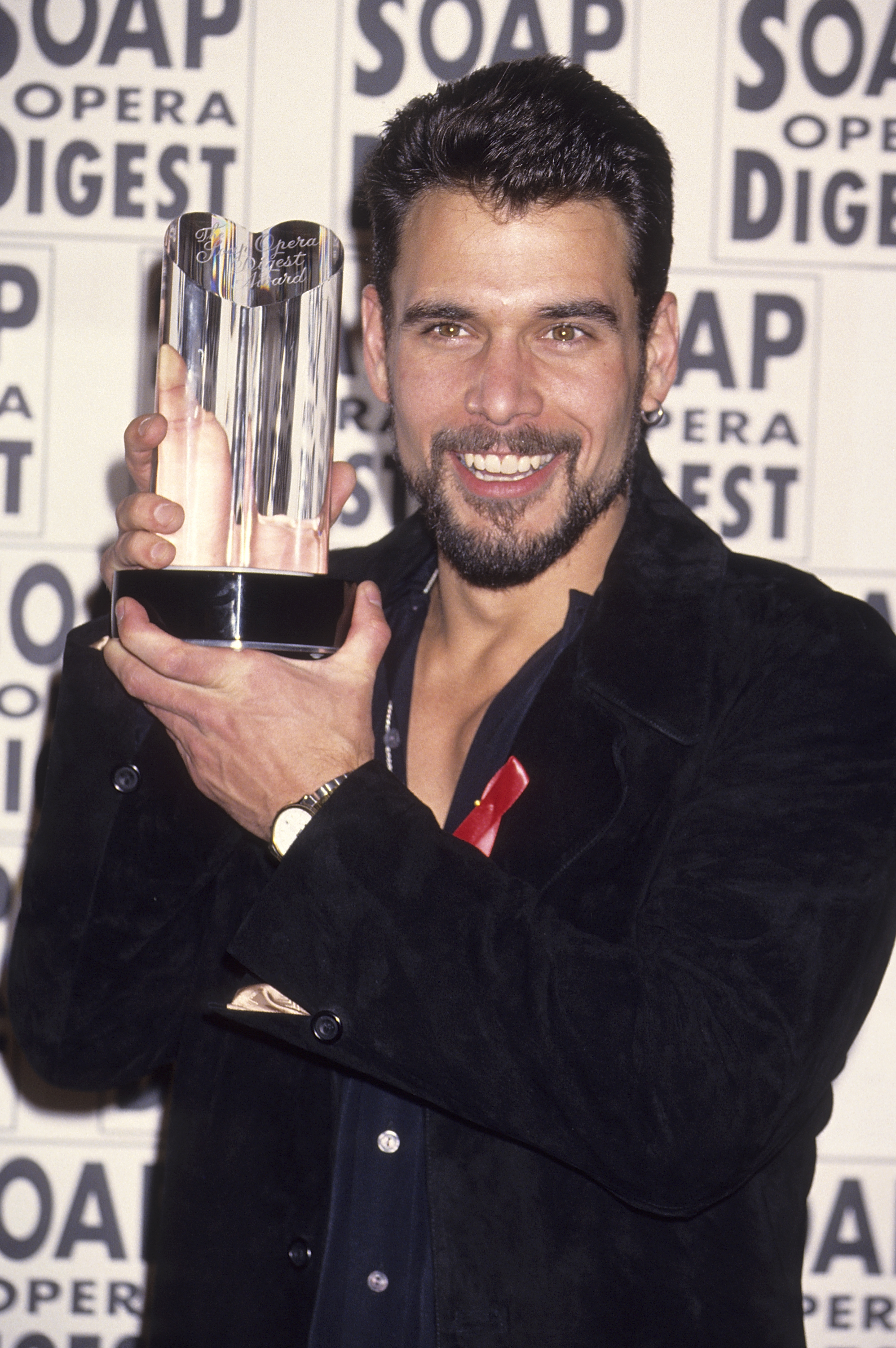Kelker-Kelly was photographed with a Soap Opera Digest Award in 1994, during the period when he and Rinna were playing Bo and Billie. Their success as an on-screen pair makes Rinna's later description of their off-camera relationship even more striking.