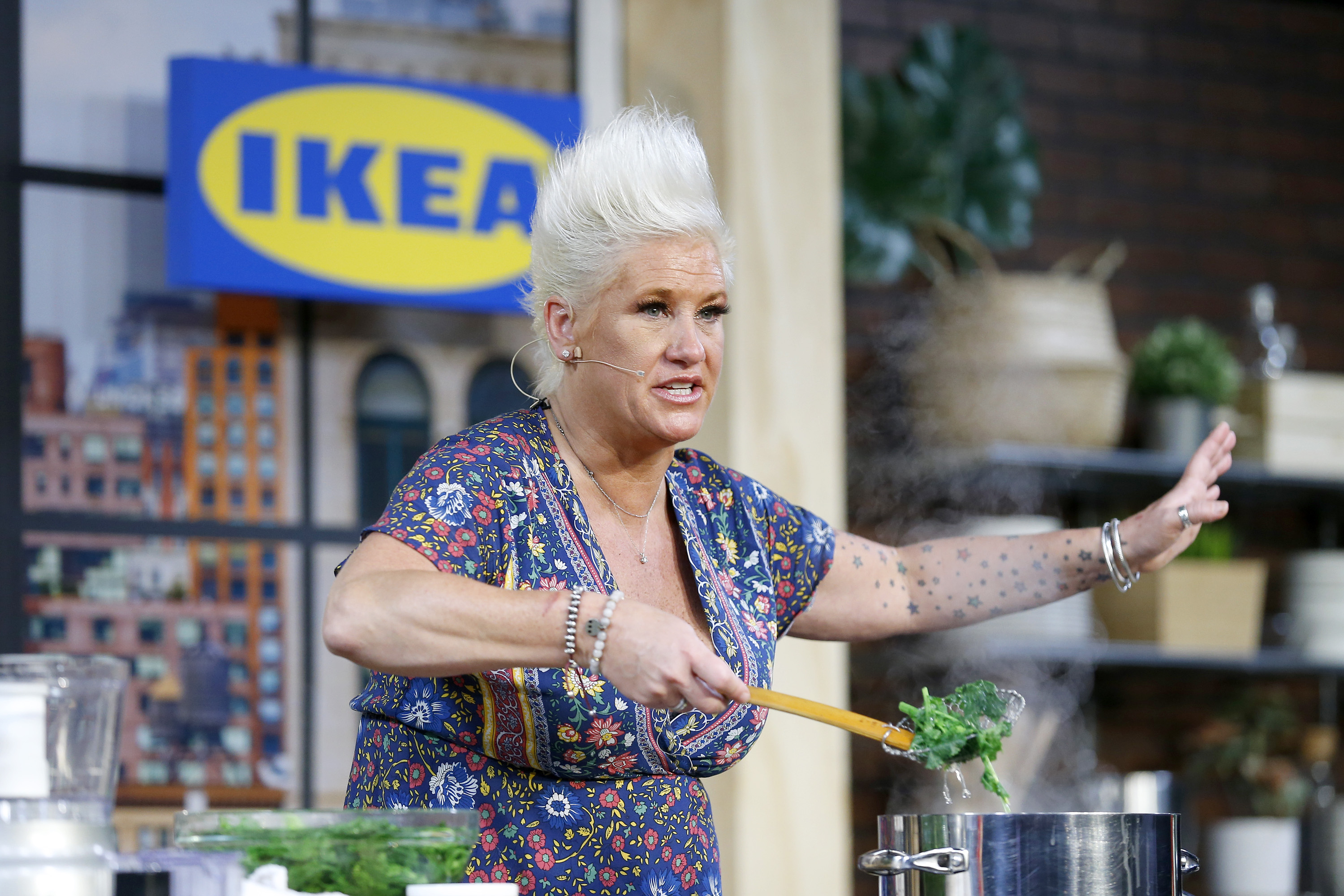 Chef Anne Burrell leads a culinary demonstration at the New York City Wine & Food Festival's Grand Tasting on October 13, 2019 | Source: Getty Images