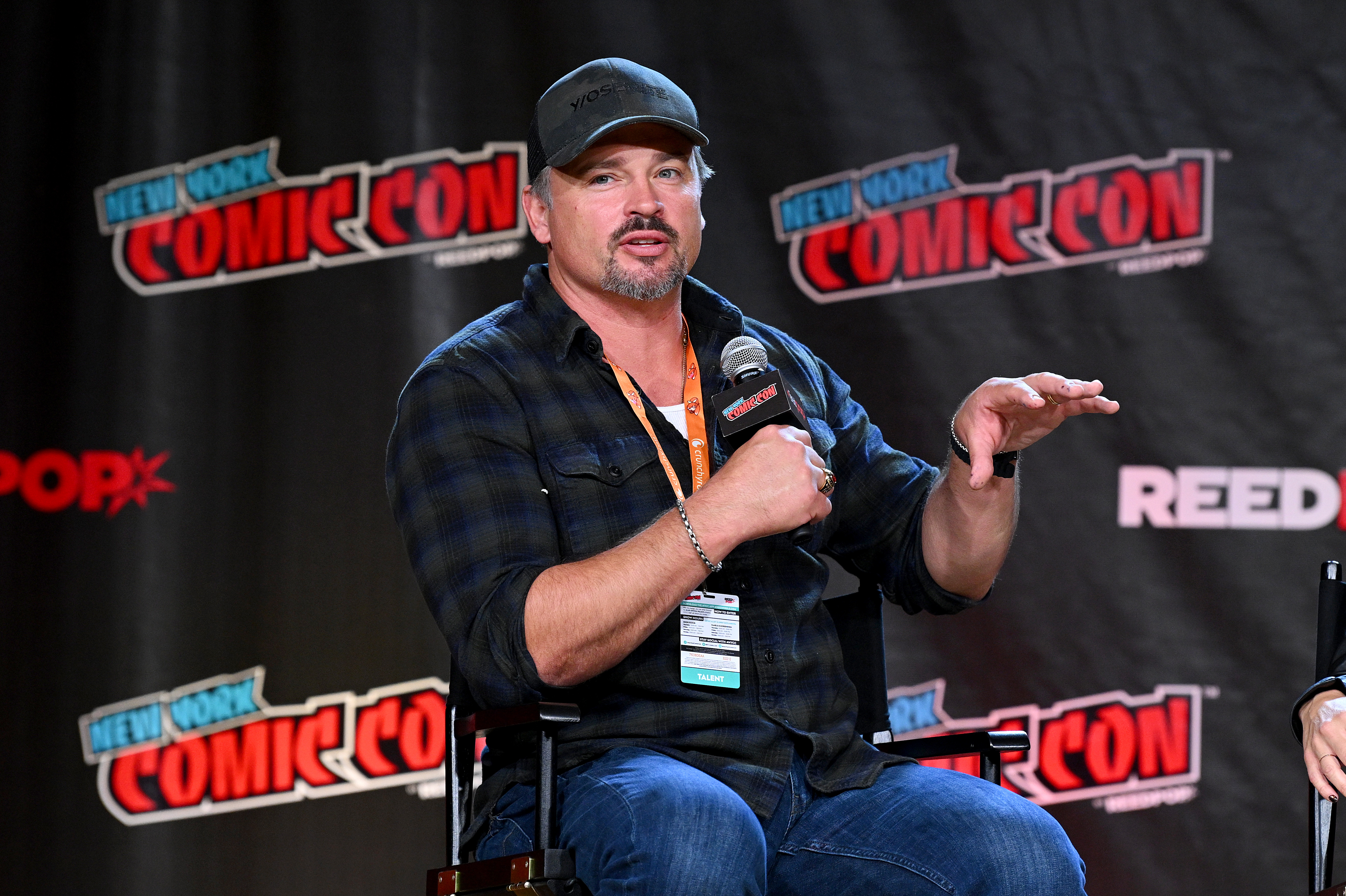 Tom Welling speaks onstage at the Smallville Cast Reunion during New York Comic Con on October 8, 2022, in New York City | Source: Getty Images